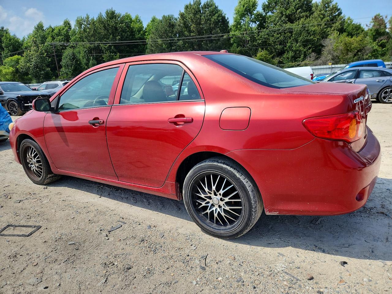 2010 Toyota Corolla Le Red vin: 1NXBU4EE9AZ204178