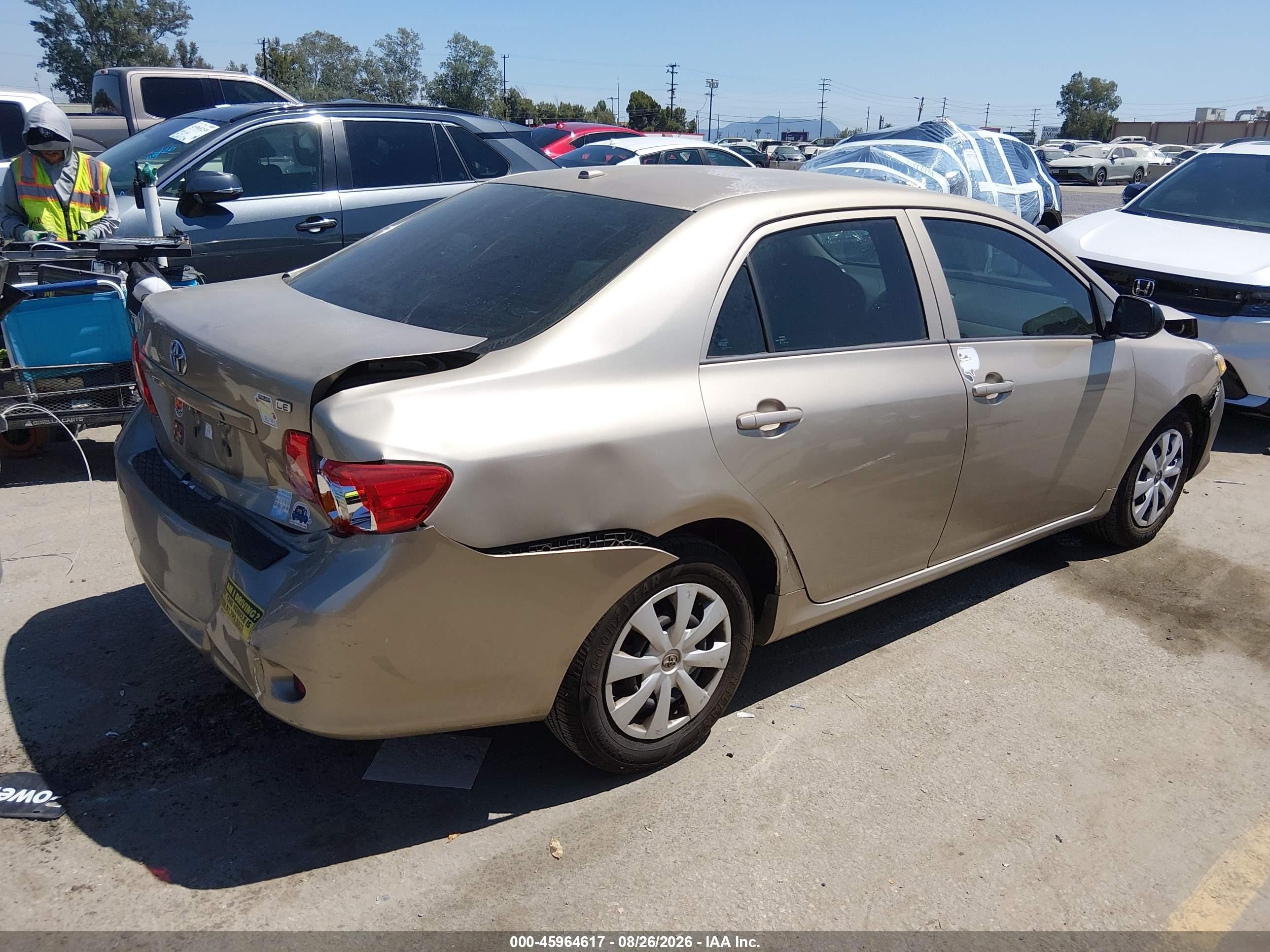 2010 Toyota Corolla Le Tan vin: 1NXBU4EE9AZ210207