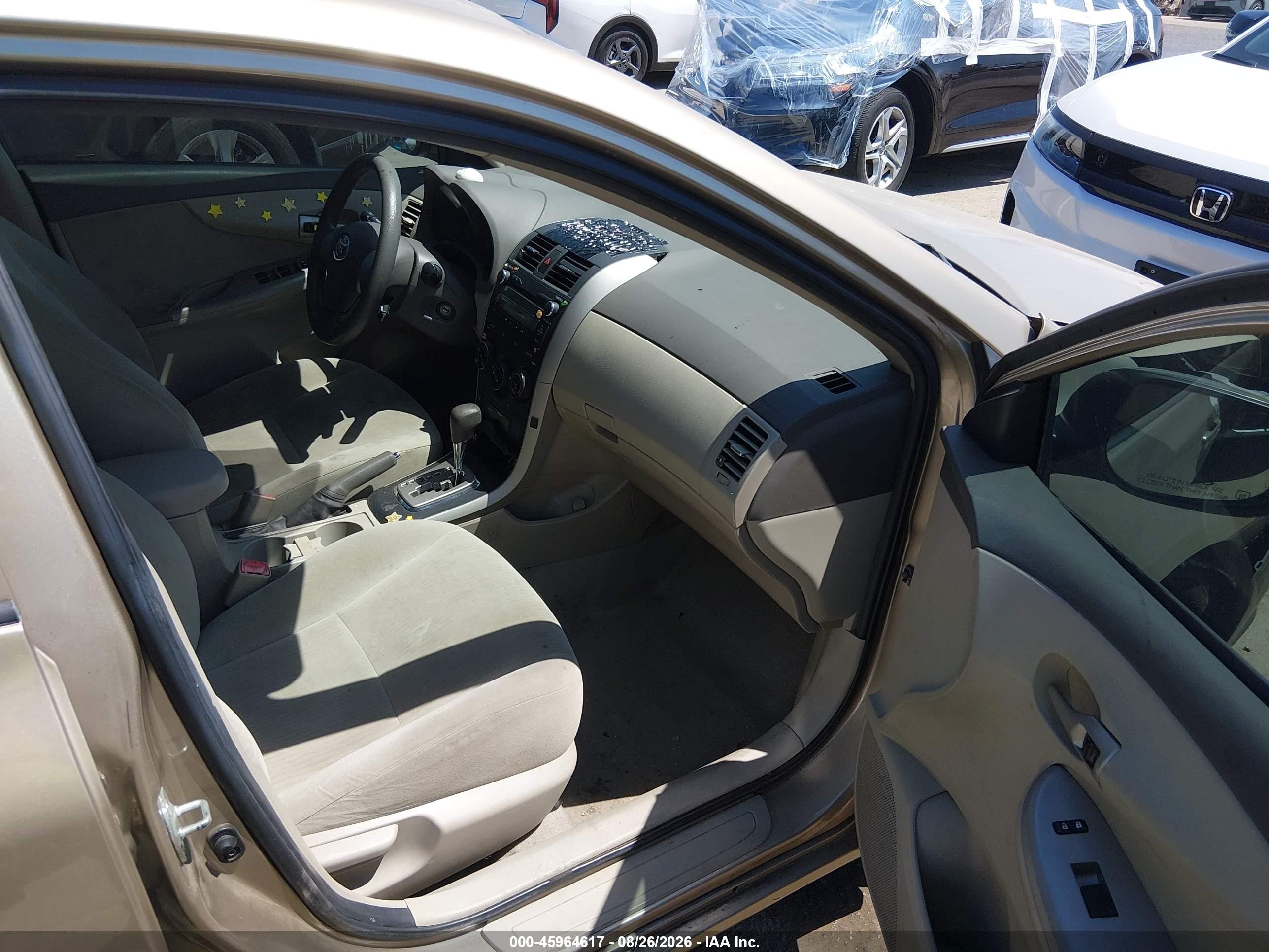2010 Toyota Corolla Le Tan vin: 1NXBU4EE9AZ210207