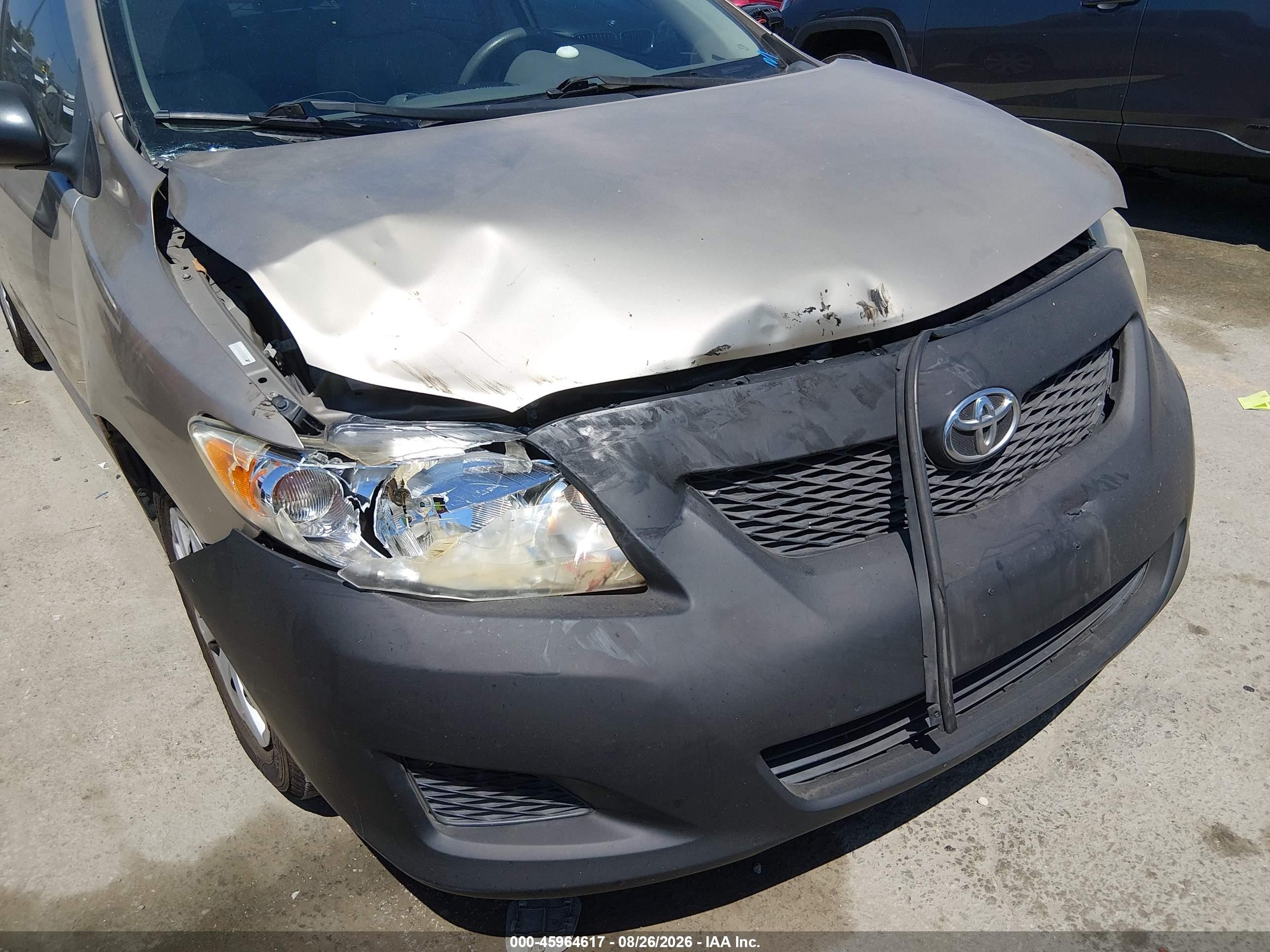 2010 Toyota Corolla Le Tan vin: 1NXBU4EE9AZ210207