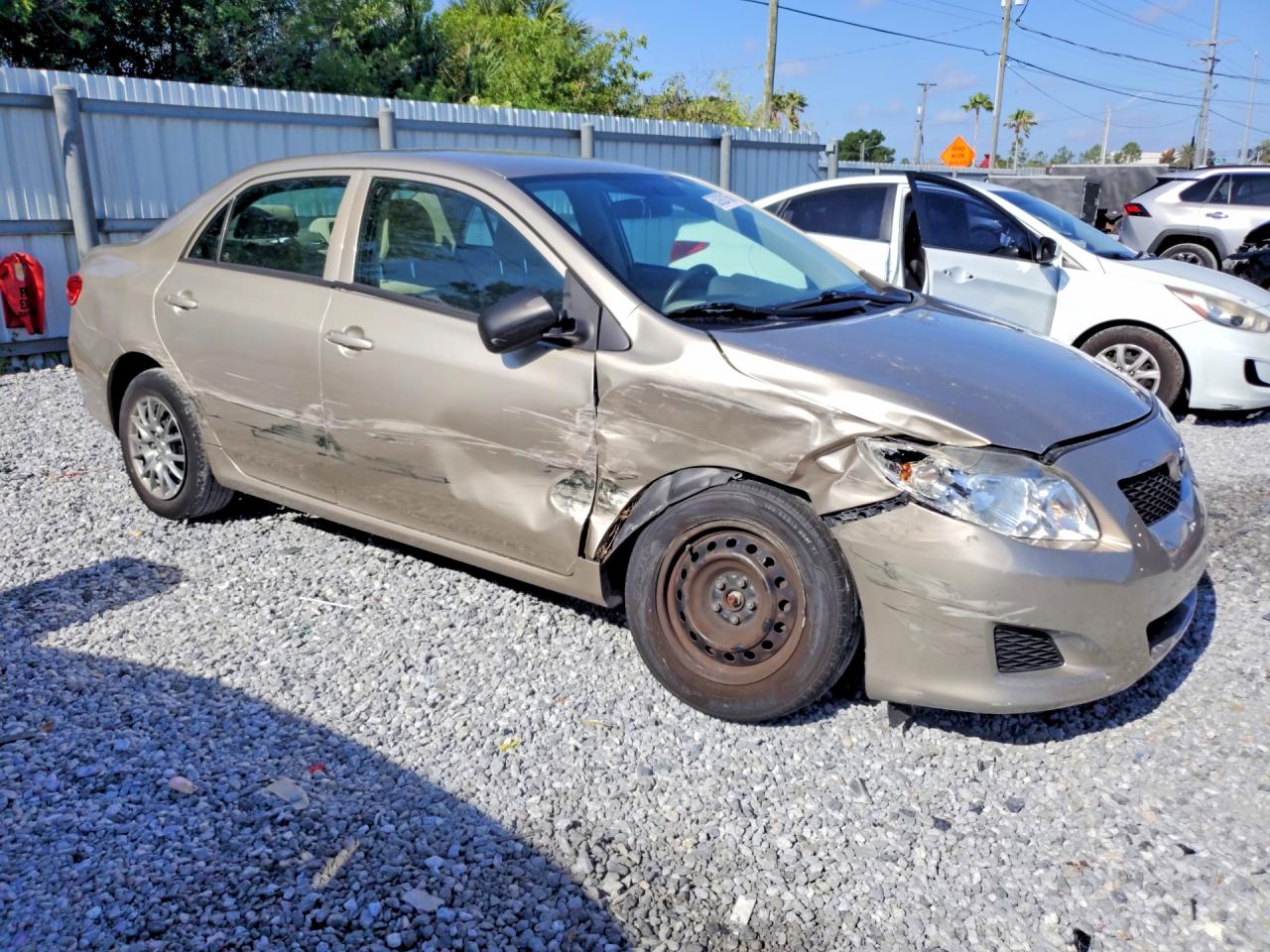 2010 Toyota Corolla Base Tan vin: 1NXBU4EE9AZ233003