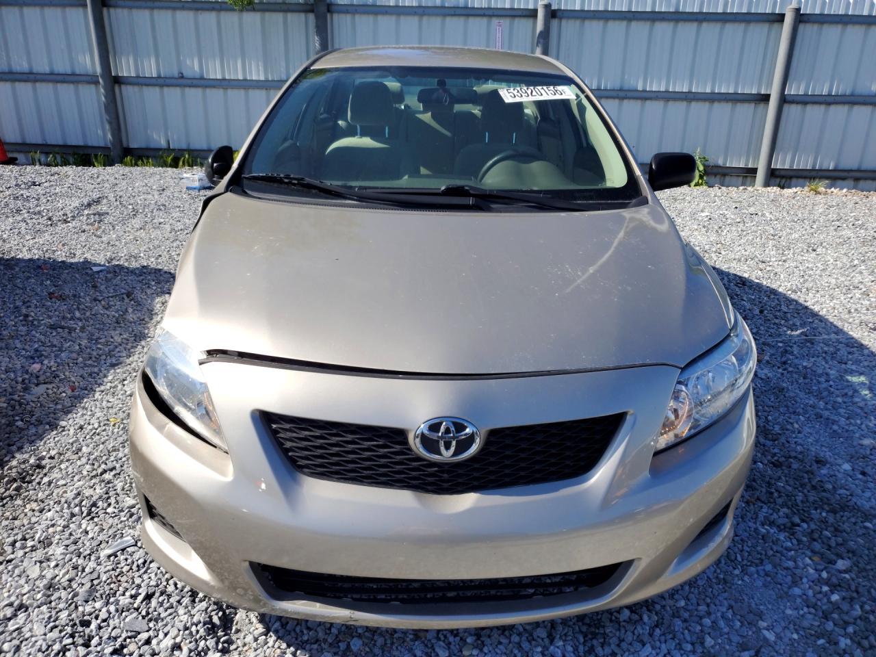 2010 Toyota Corolla Base Tan vin: 1NXBU4EE9AZ233003