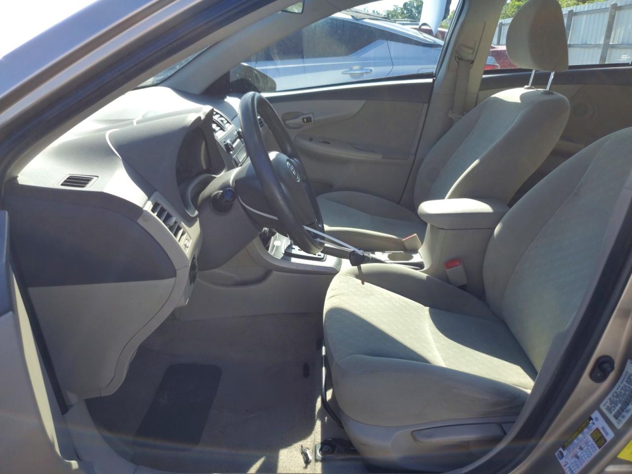 2010 Toyota Corolla Base Tan vin: 1NXBU4EE9AZ233003