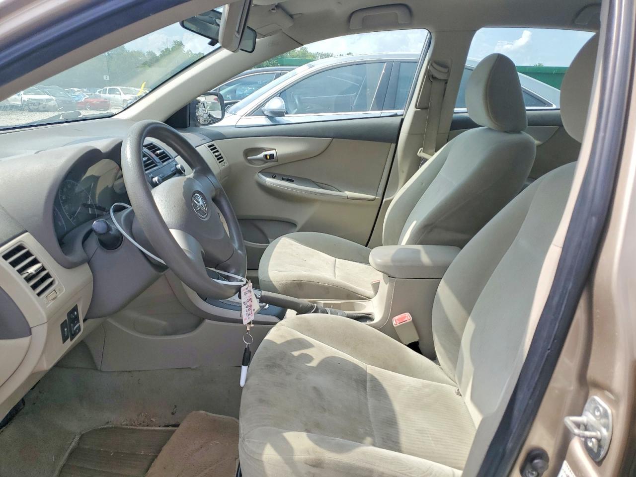2010 Toyota Corolla Le Cream vin: 1NXBU4EE9AZ235639