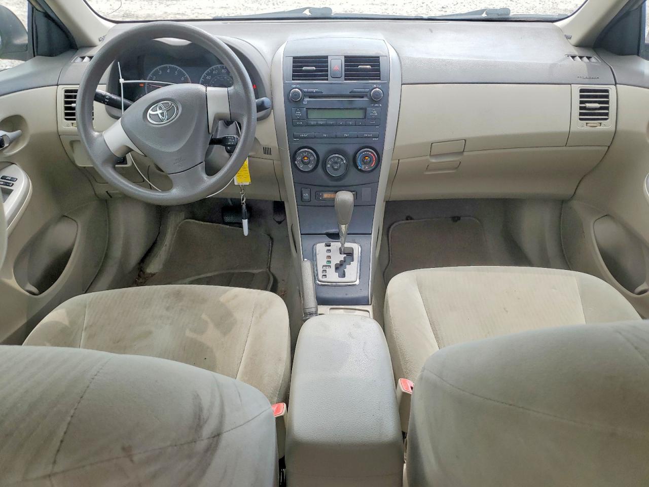 2010 Toyota Corolla Le Cream vin: 1NXBU4EE9AZ235639