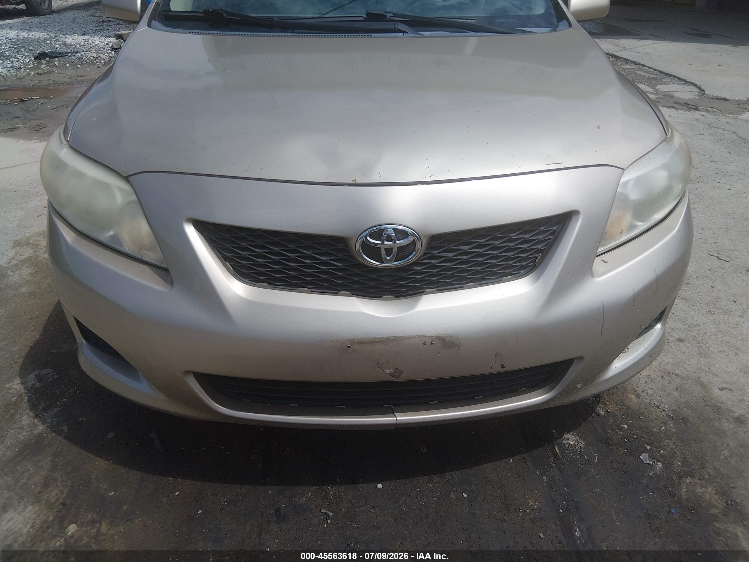 2010 Toyota Corolla Le Gold vin: 1NXBU4EEXAZ181851