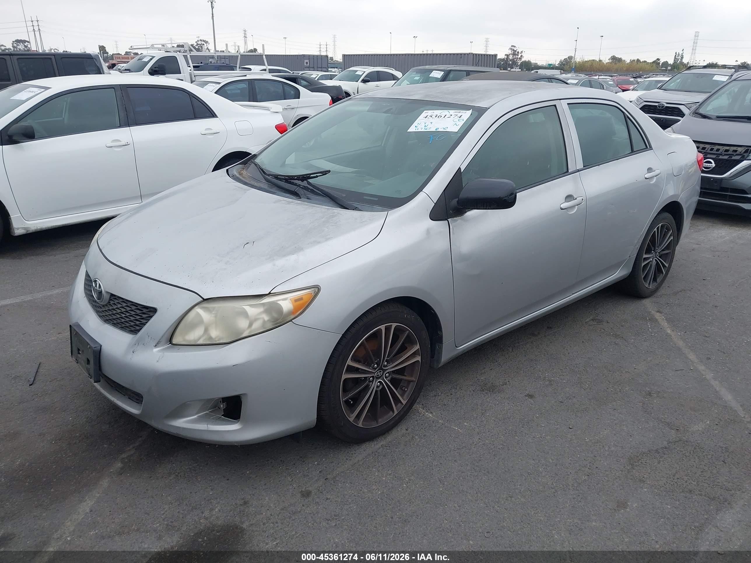 2010 Toyota Corolla   Silver vin: 1NXBU4EEXAZ216081