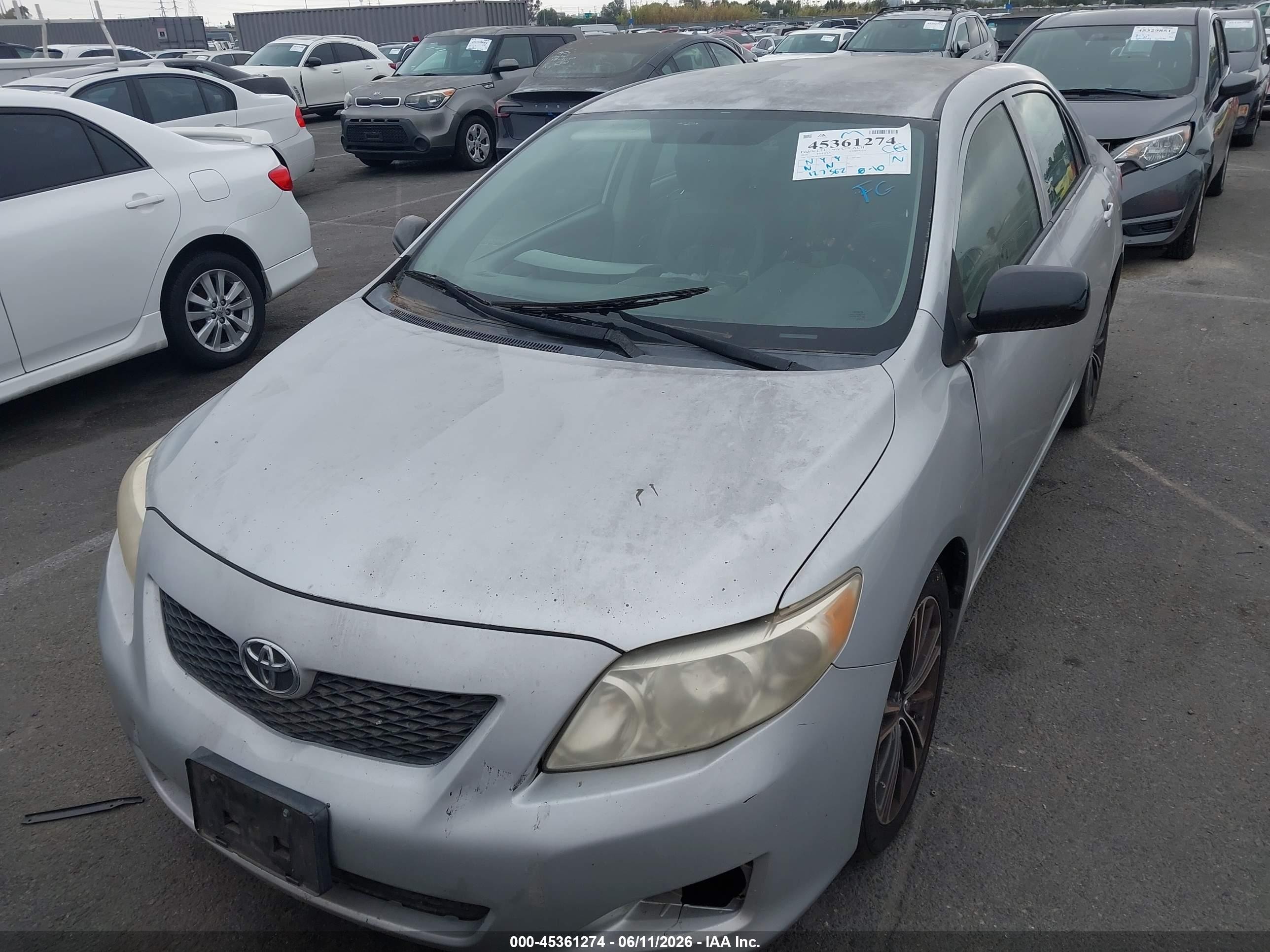 2010 Toyota Corolla   Silver vin: 1NXBU4EEXAZ216081