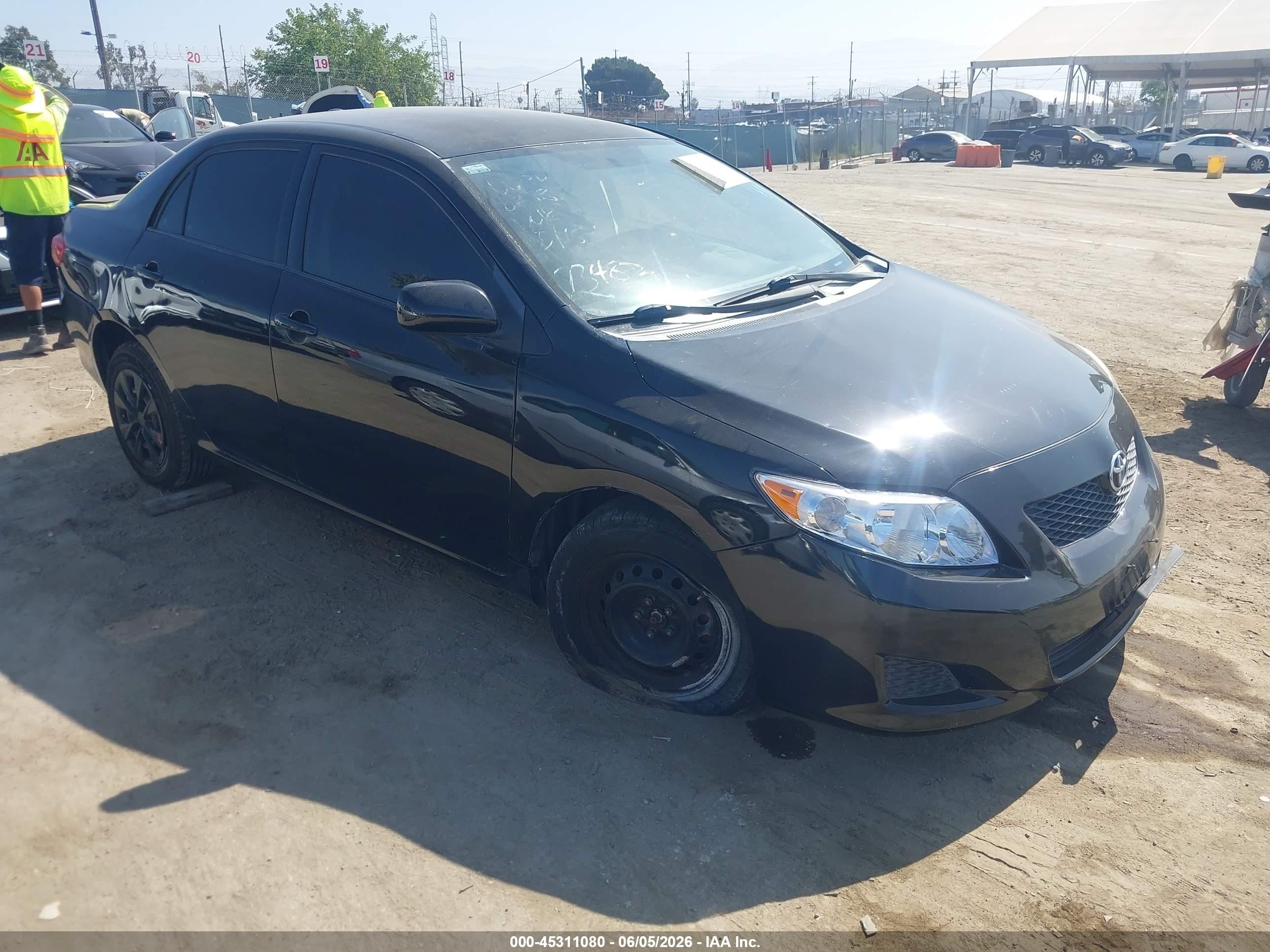 2010 Toyota Corolla Le Black vin: 1NXBU4EEXAZ224598