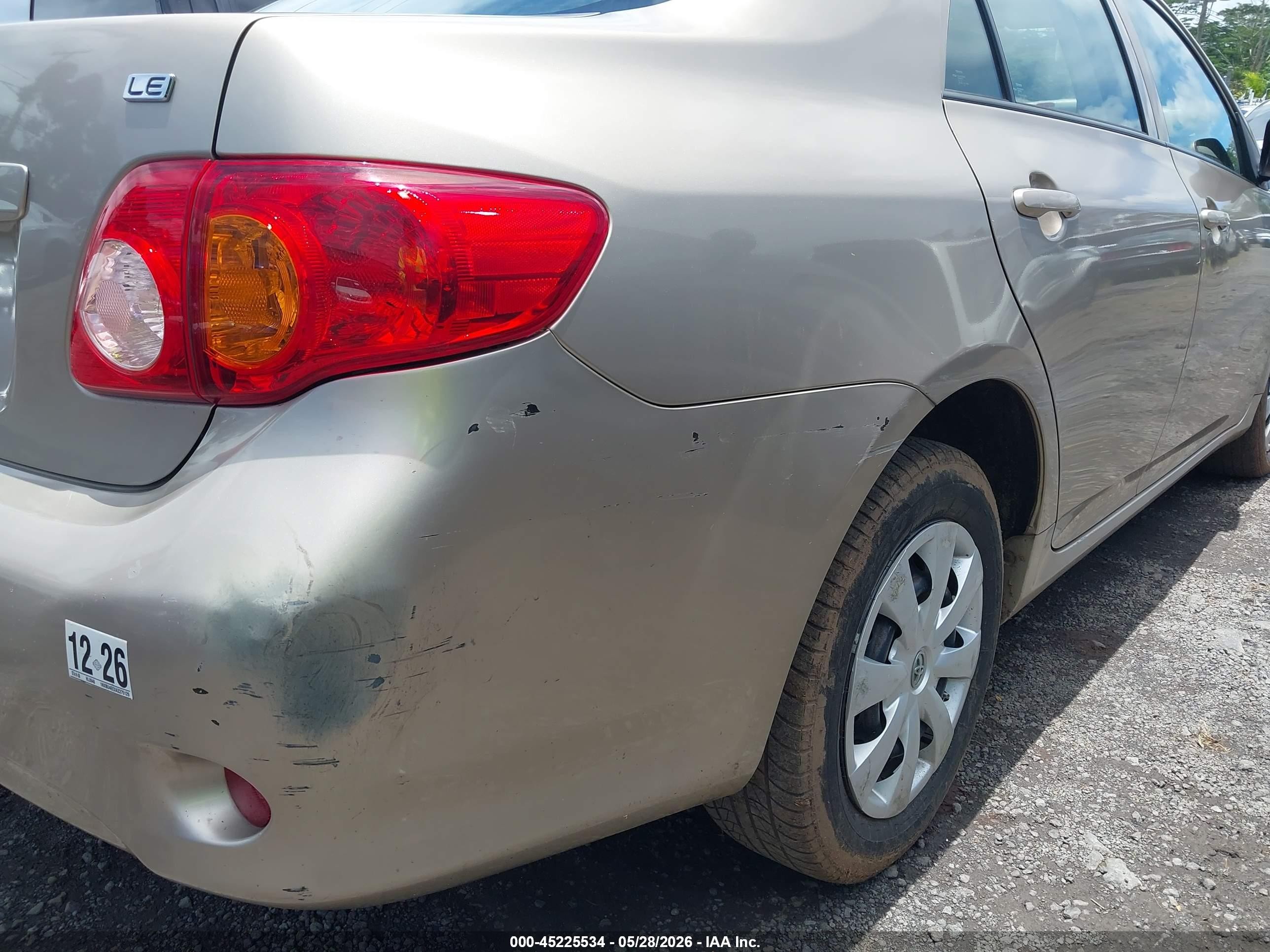 2010 Toyota Corolla Le Gold vin: 1NXBU4EEXAZ275129