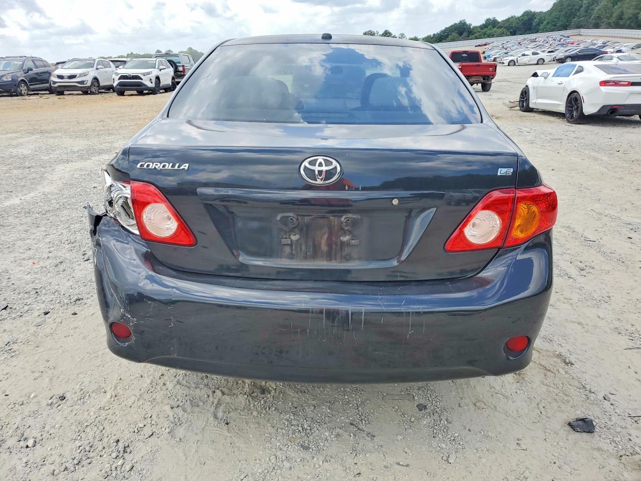 2010 Toyota Corolla Le Black vin: 1NXBU4EEXAZ367793