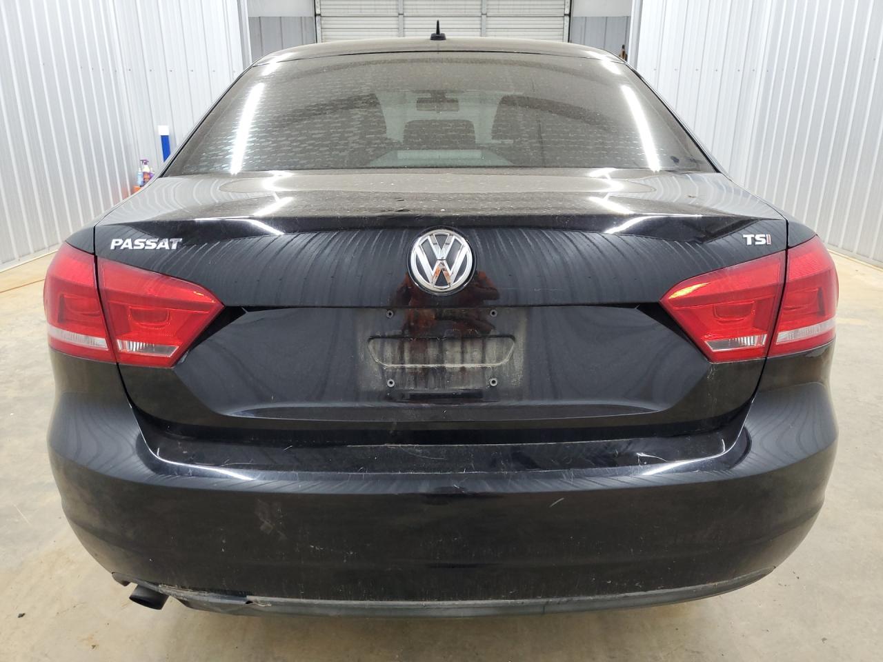 2014 Volkswagen Passat S Black vin: 1VWAS7A35EC120315 Damage: Rear Bumper Molding, Broken, Replacement Required