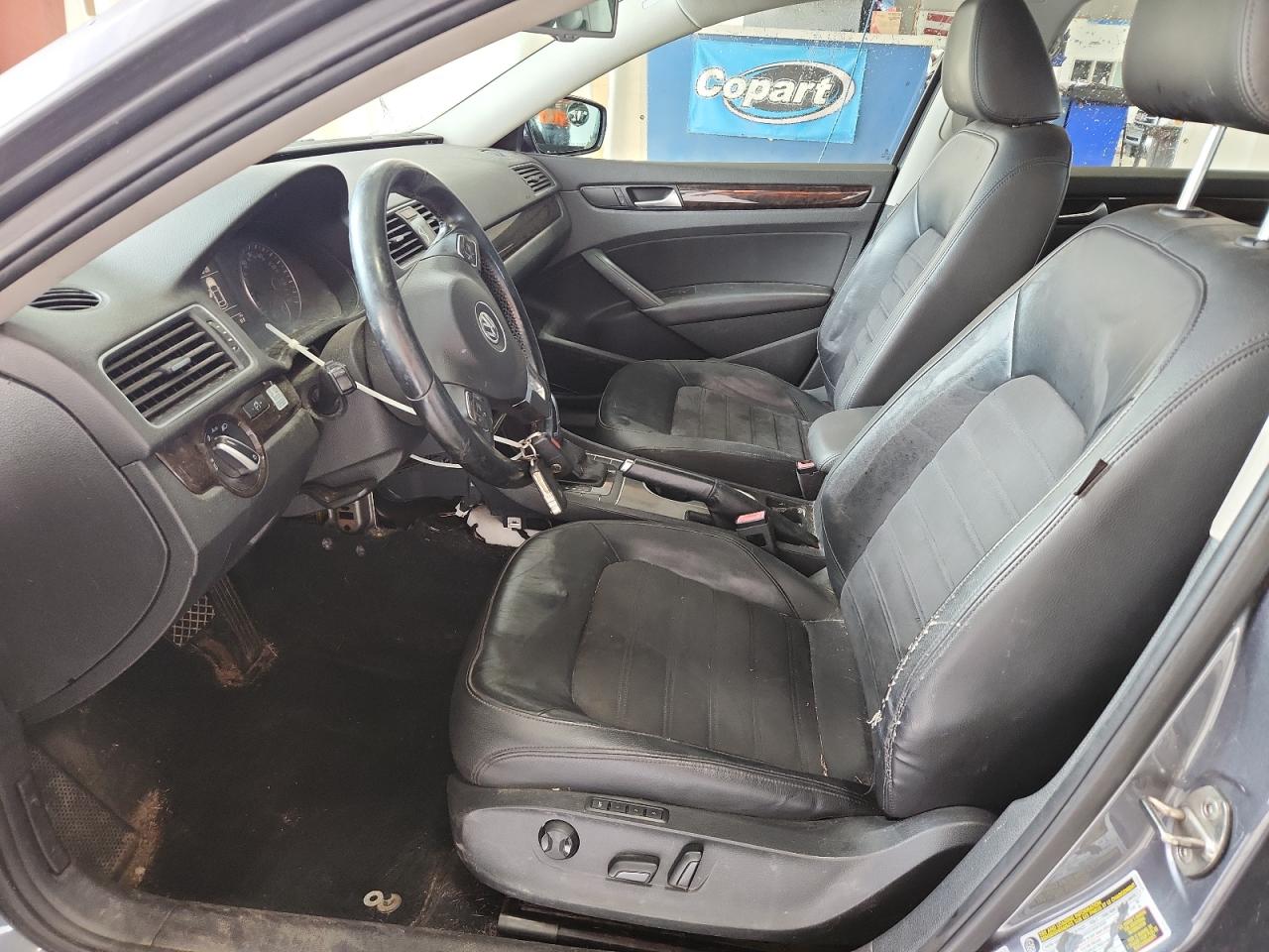 2015 Volkswagen Passat Sel Gray vin: 1VWCV7A36FC087231 Damage: Left Front Seat Back, Torn, > 12 Inches