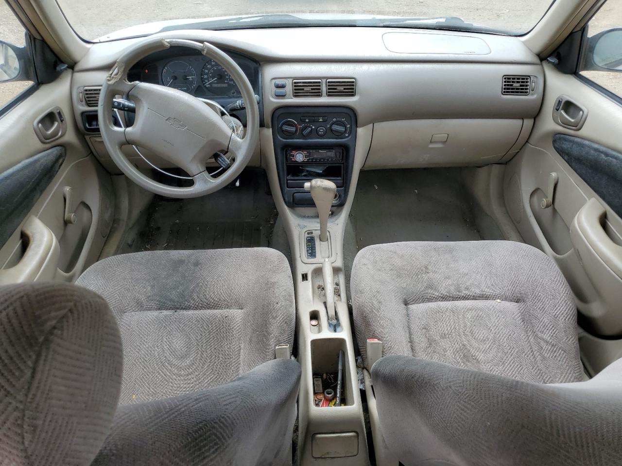 2001 Chevrolet Geo Prizm Base Бежевый vin: 1Y1SK52801Z402452