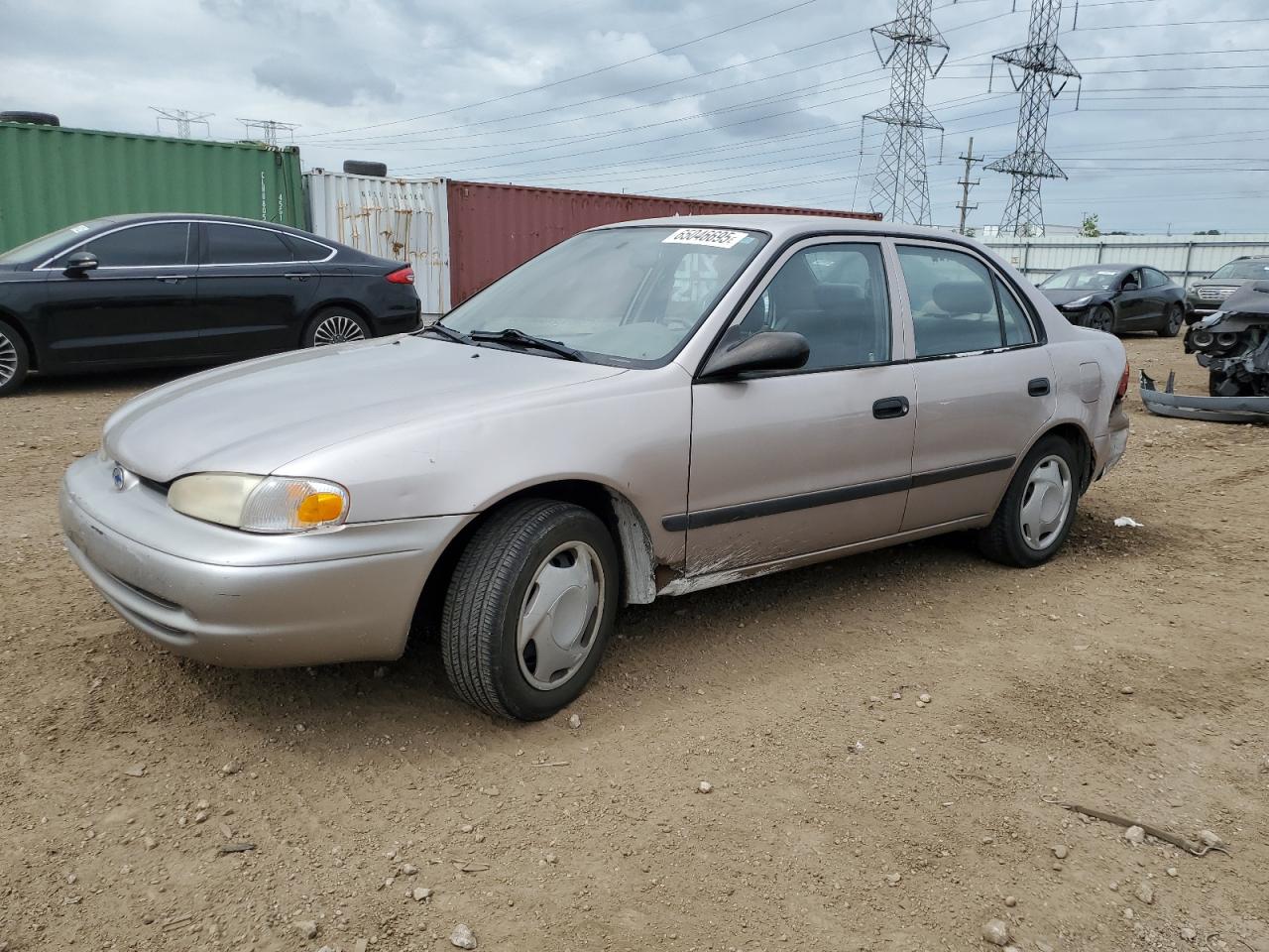 2001 Chevrolet Geo Prizm Base Бежевый vin: 1Y1SK52801Z402452