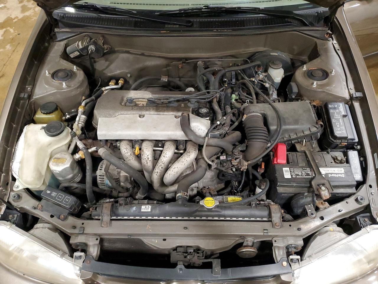 1999 Chevrolet Geo Prizm Base Brown vin: 1Y1SK5280XZ449540