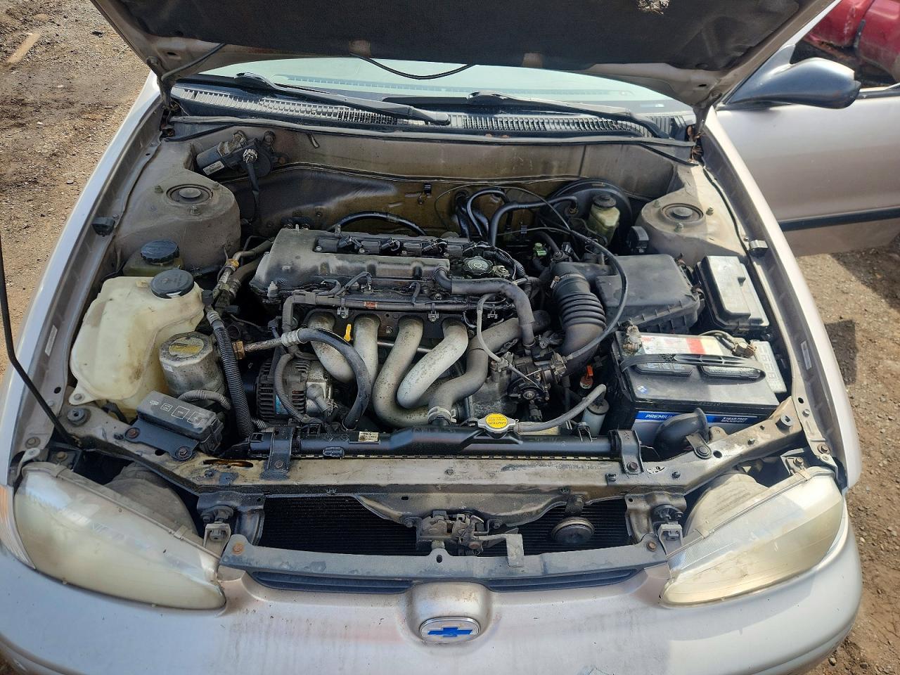 2001 Chevrolet Geo Prizm Base Желто-коричневый vin: 1Y1SK52811Z413167