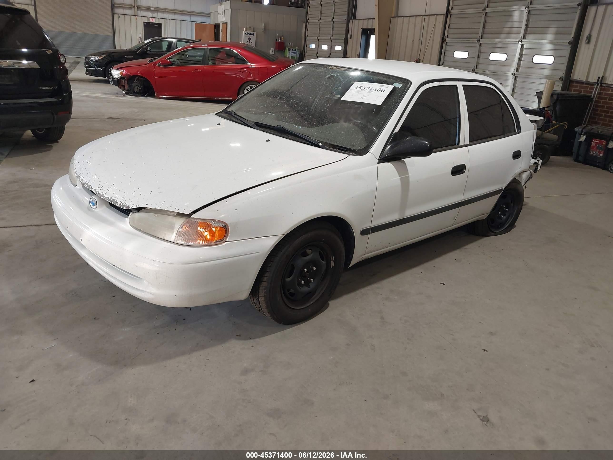 2002 Chevrolet Prizm   White vin: 1Y1SK52812Z407919