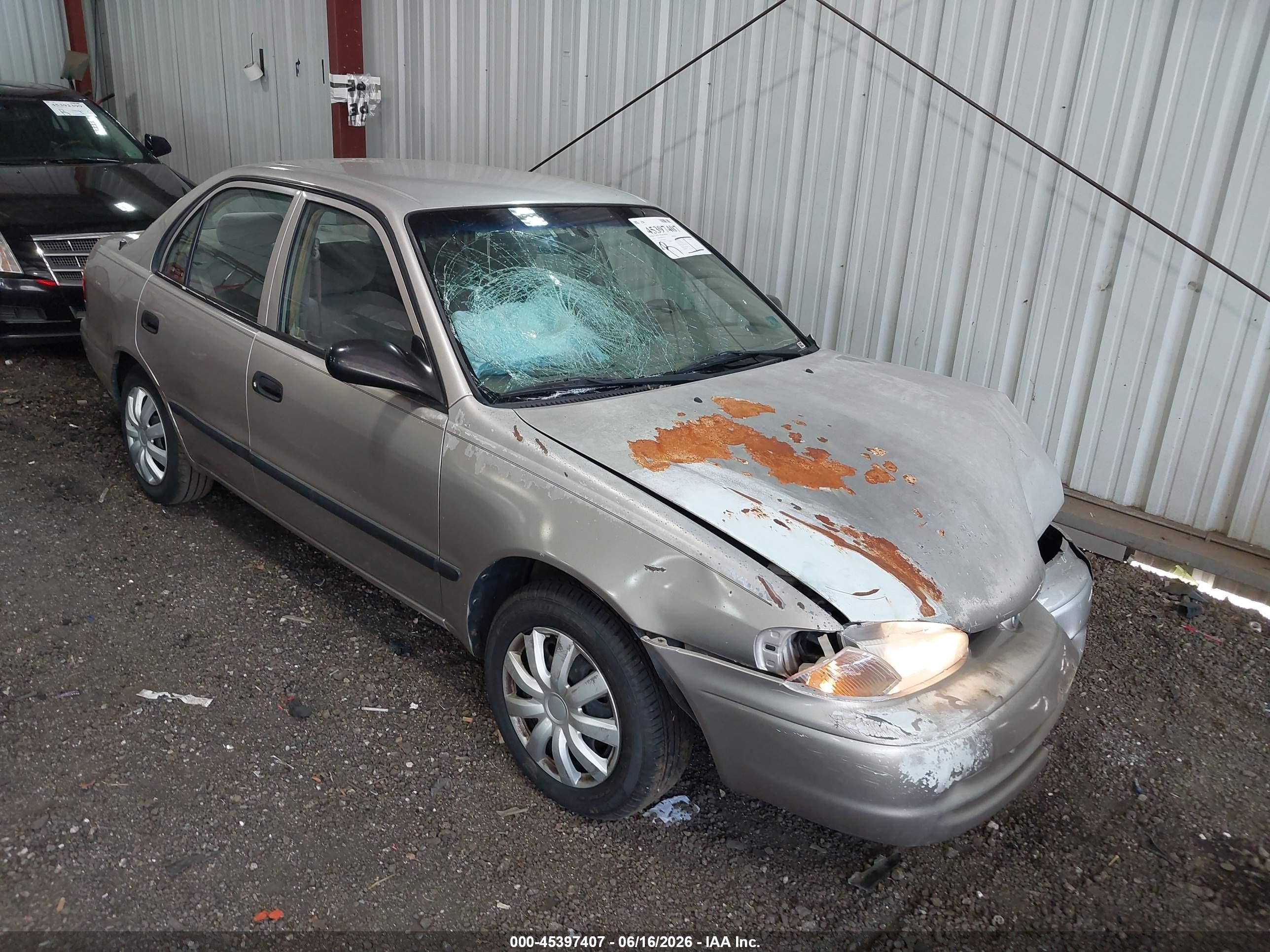 2002 Chevrolet Prizm   Beige vin: 1Y1SK52872Z408783