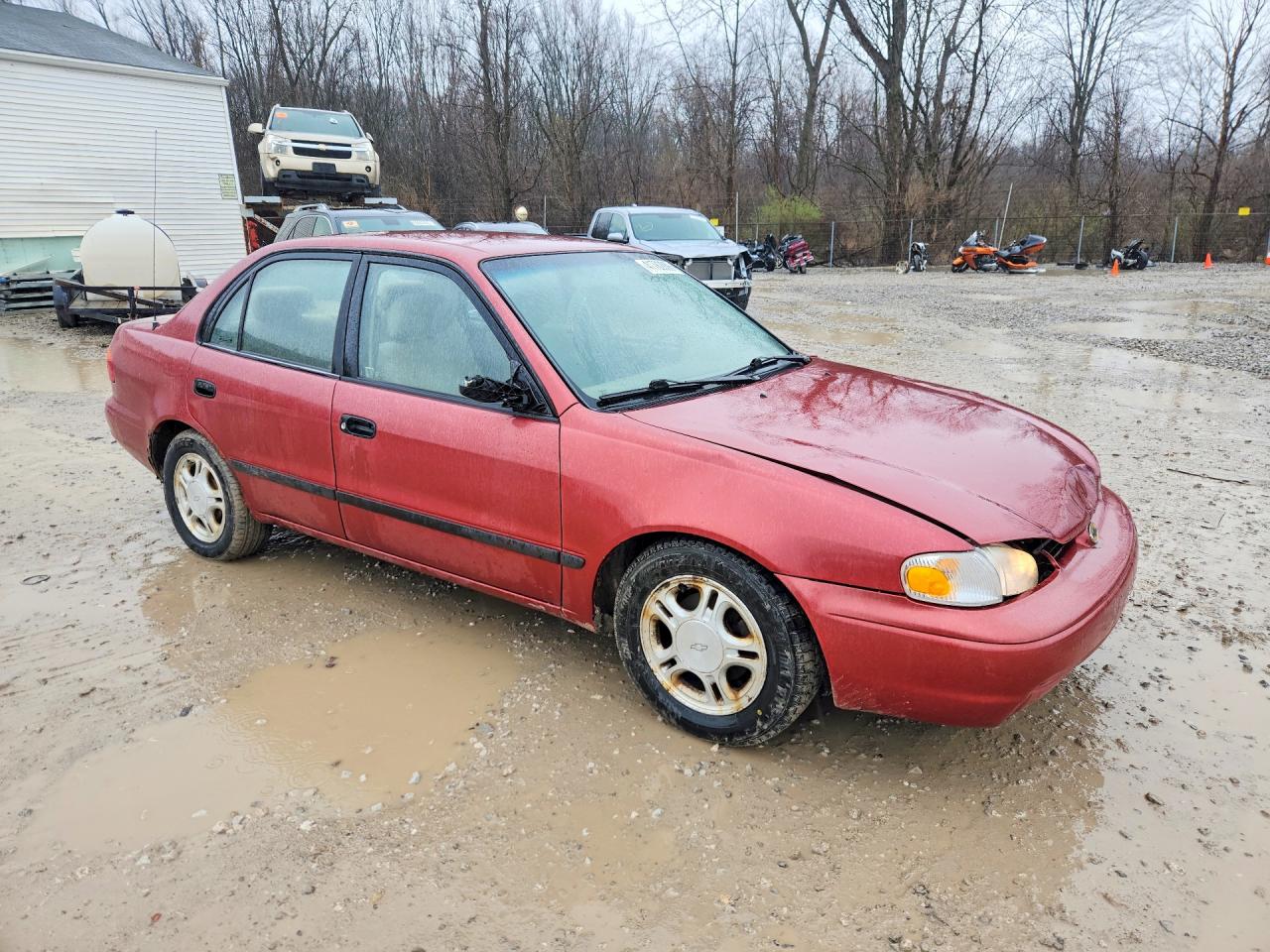 1999 Chevrolet Geo Prizm Base Burgundy vin: 1Y1SK5289XZ414432