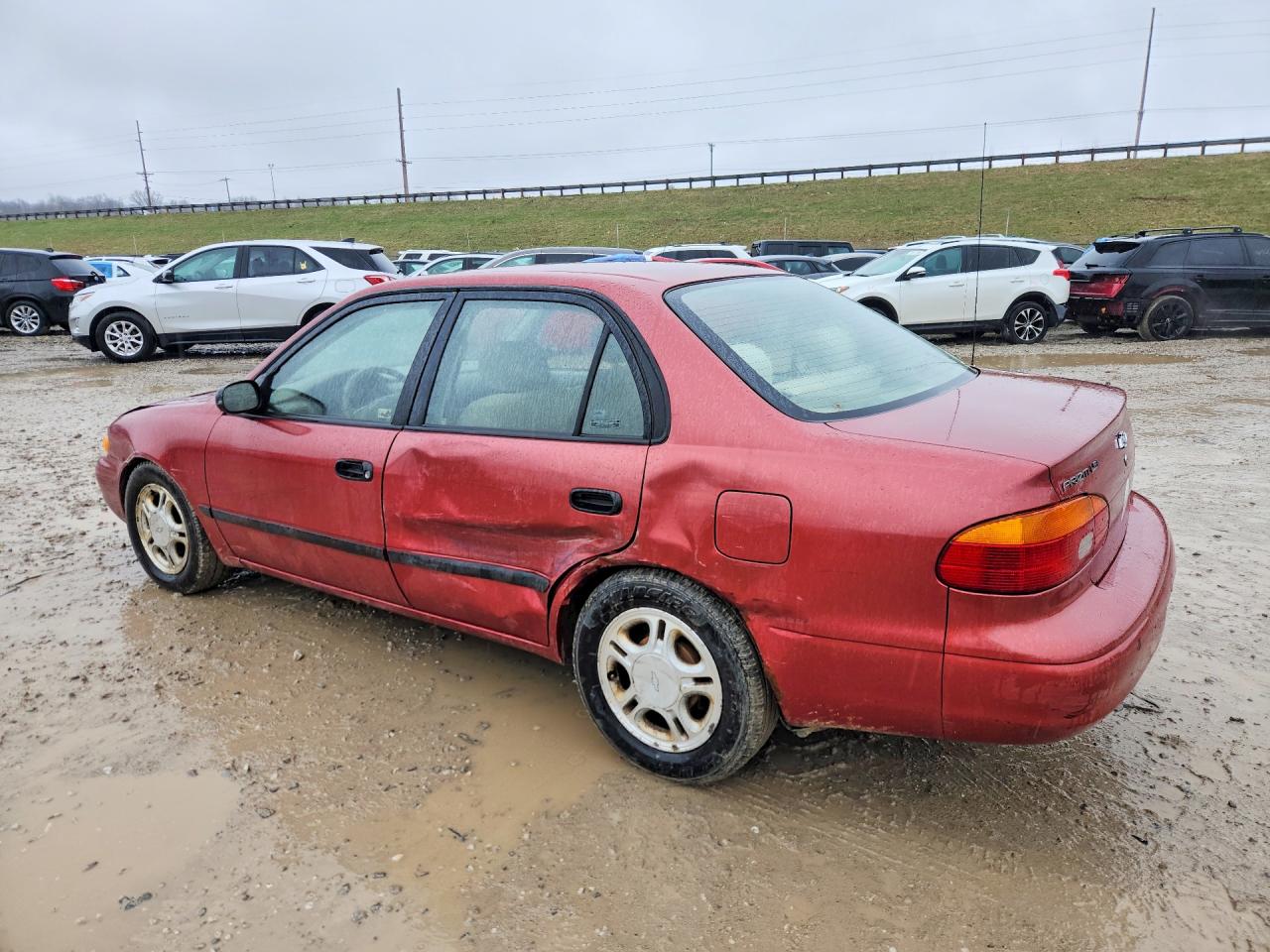 1999 Chevrolet Geo Prizm Base Burgundy vin: 1Y1SK5289XZ414432