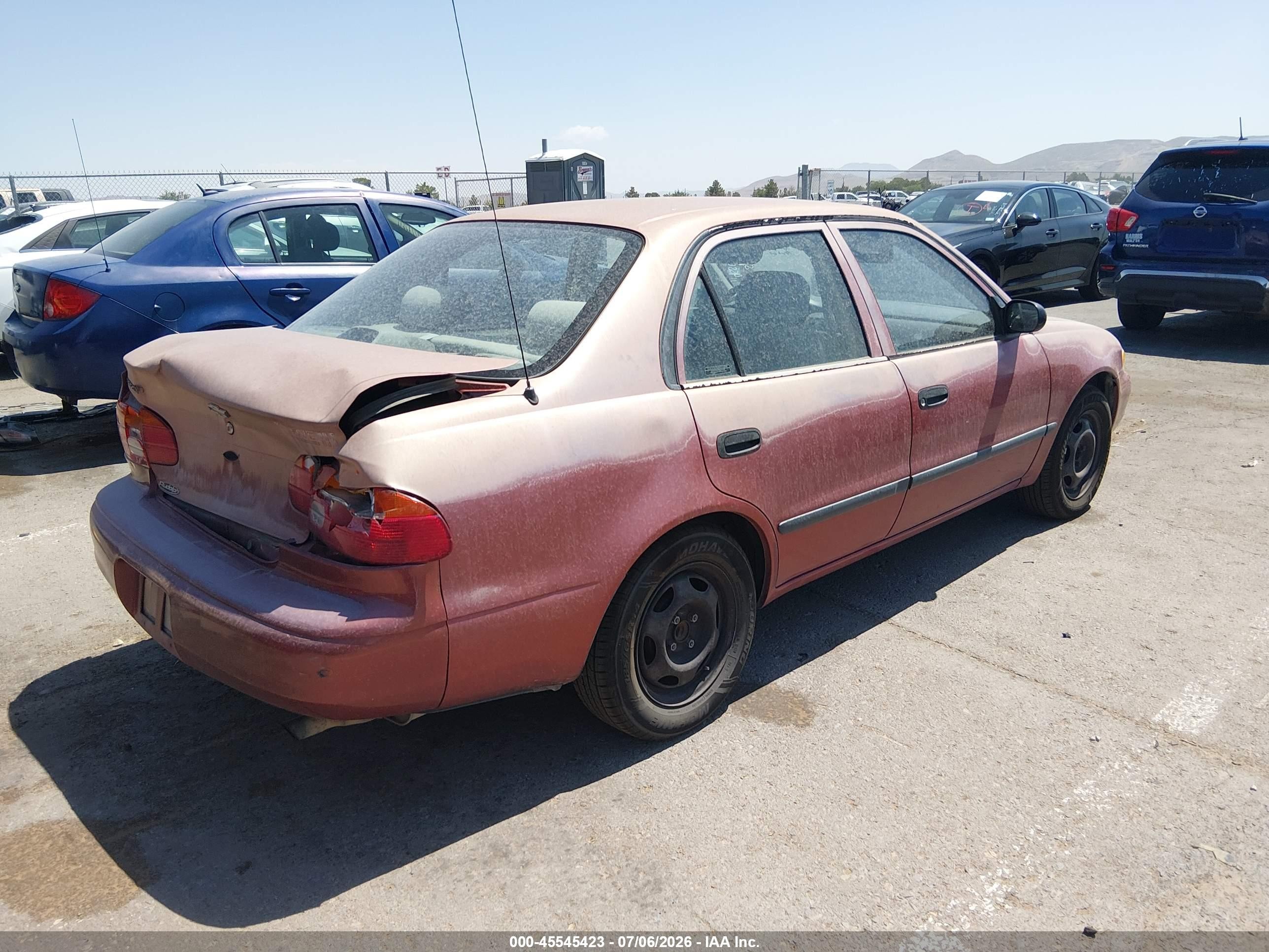1998 Chevrolet Prizm   Maroon vin: 1Y1SK528XWZ436664