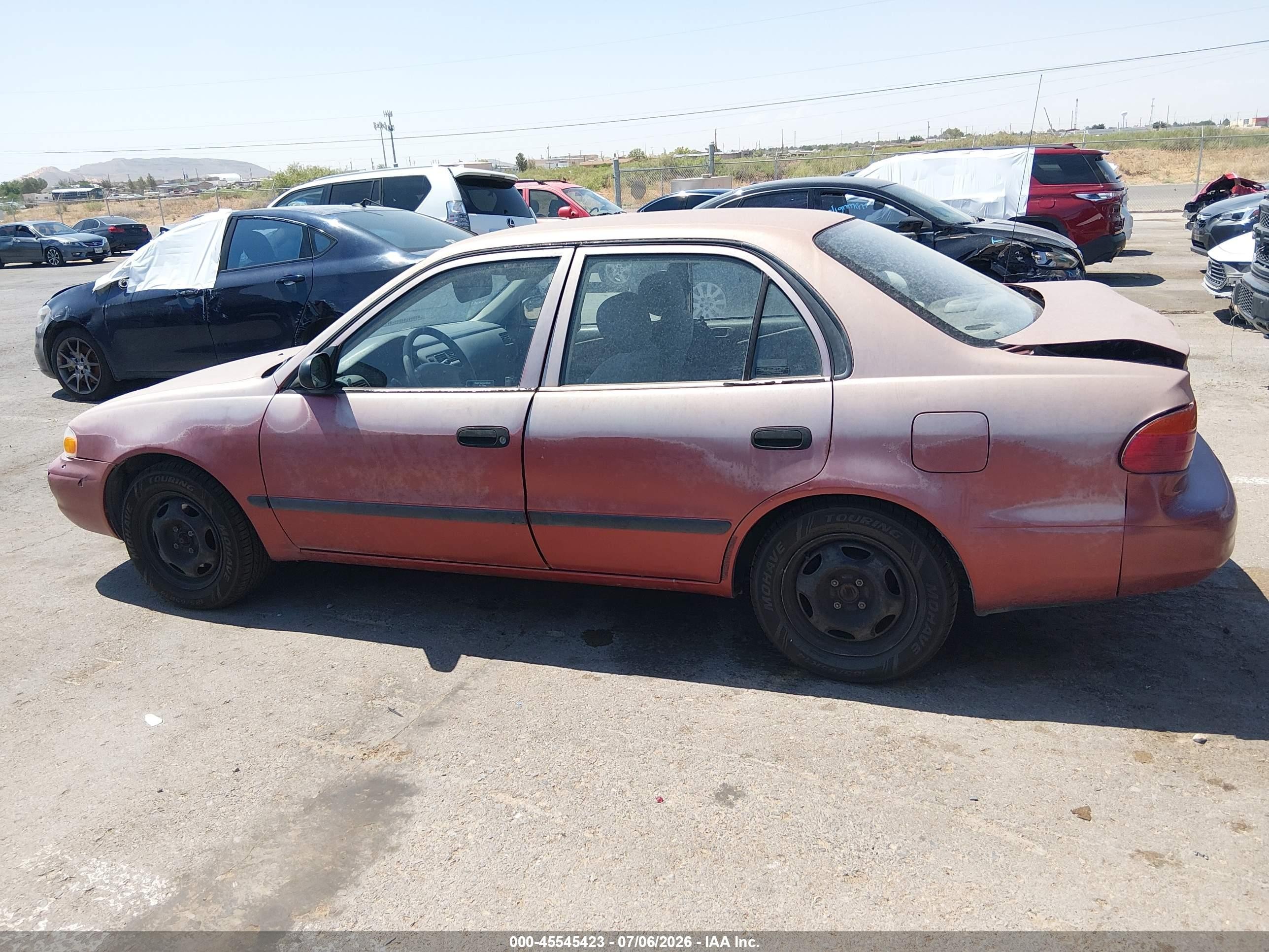 1998 Chevrolet Prizm   Maroon vin: 1Y1SK528XWZ436664