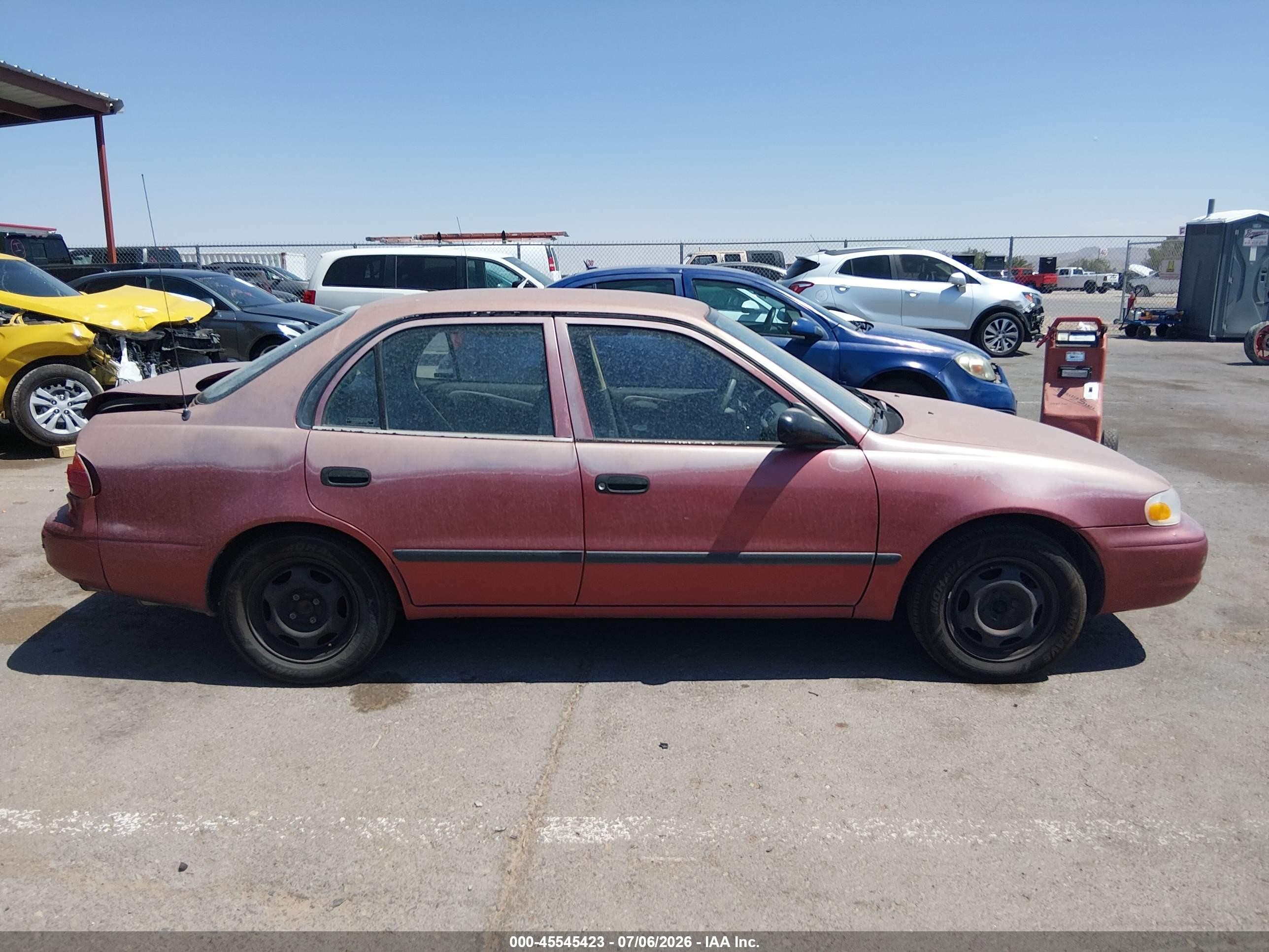 1998 Chevrolet Prizm   Maroon vin: 1Y1SK528XWZ436664