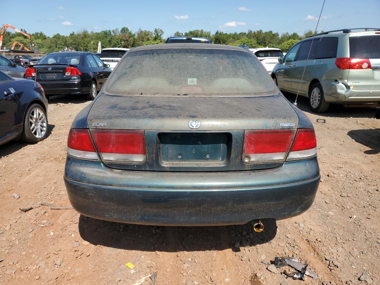 Price & History 1995 Mazda 626 Dx 2.0l 4 vin: 1YVGE22C2S5377738
