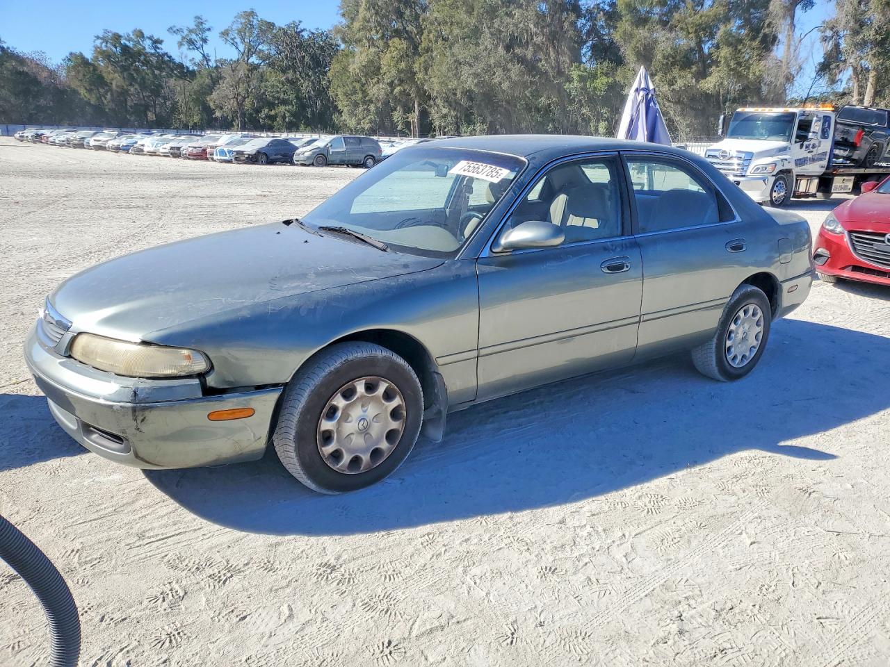 1996 Mazda 626 Dx Tan vin: 1YVGE22C4T5505625