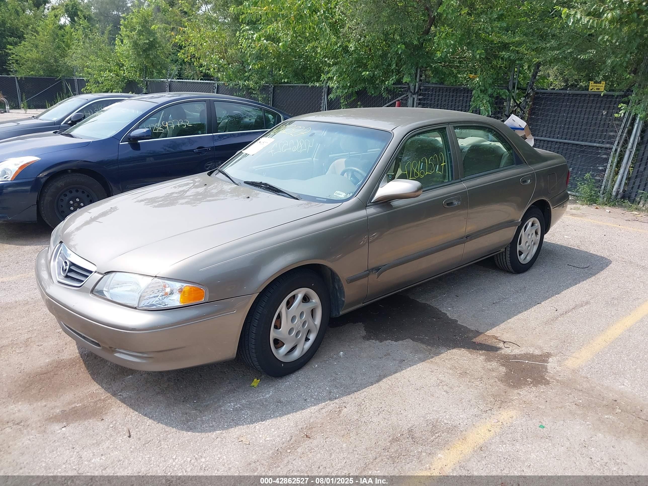 2001 Mazda 626 Es/lx Brown vin: 1YVGF22C015220432
