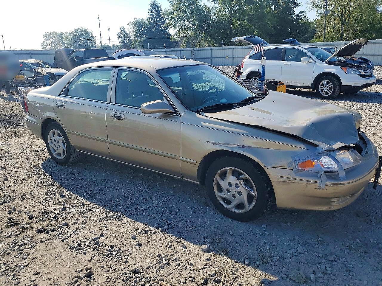 2001 Mazda 626 Es Tan vin: 1YVGF22C115221962