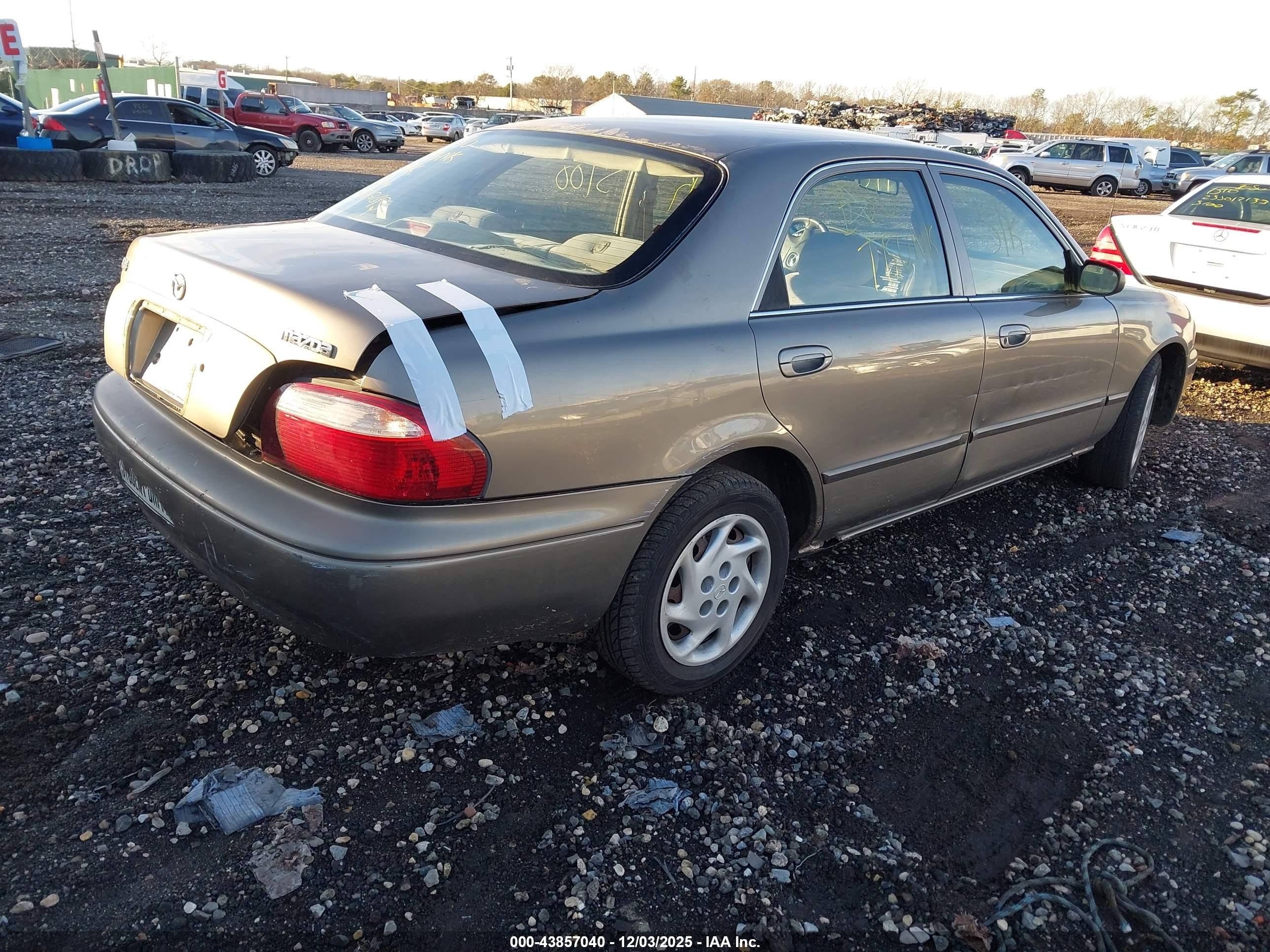 2002 Mazda 626 Lx Tan vin: 1YVGF22C125307001