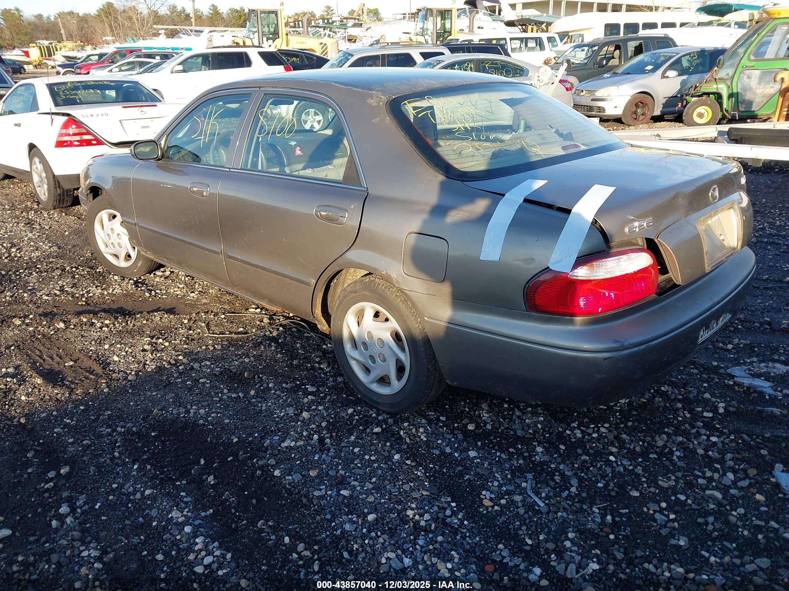 2002 Mazda 626 Lx Tan vin: 1YVGF22C125307001