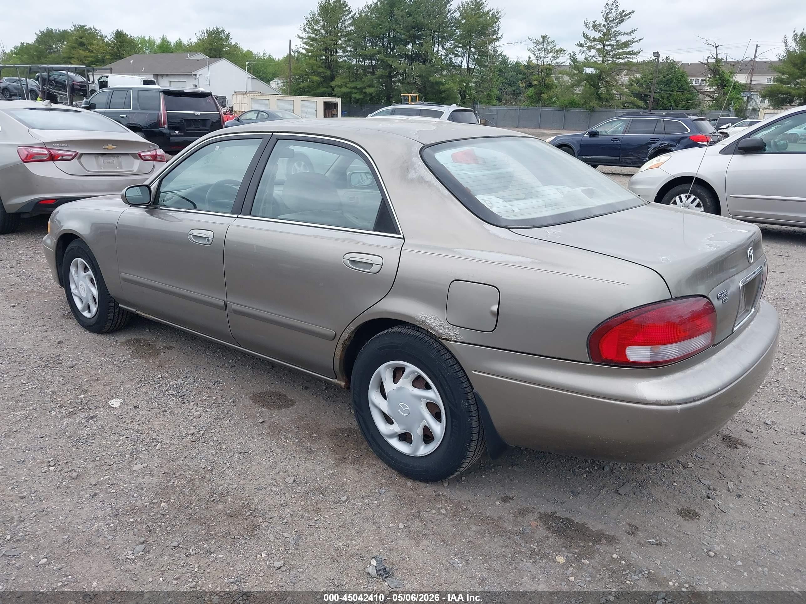 1998 Mazda 626 Dx/lx Champagne vin: 1YVGF22C1W5727458
