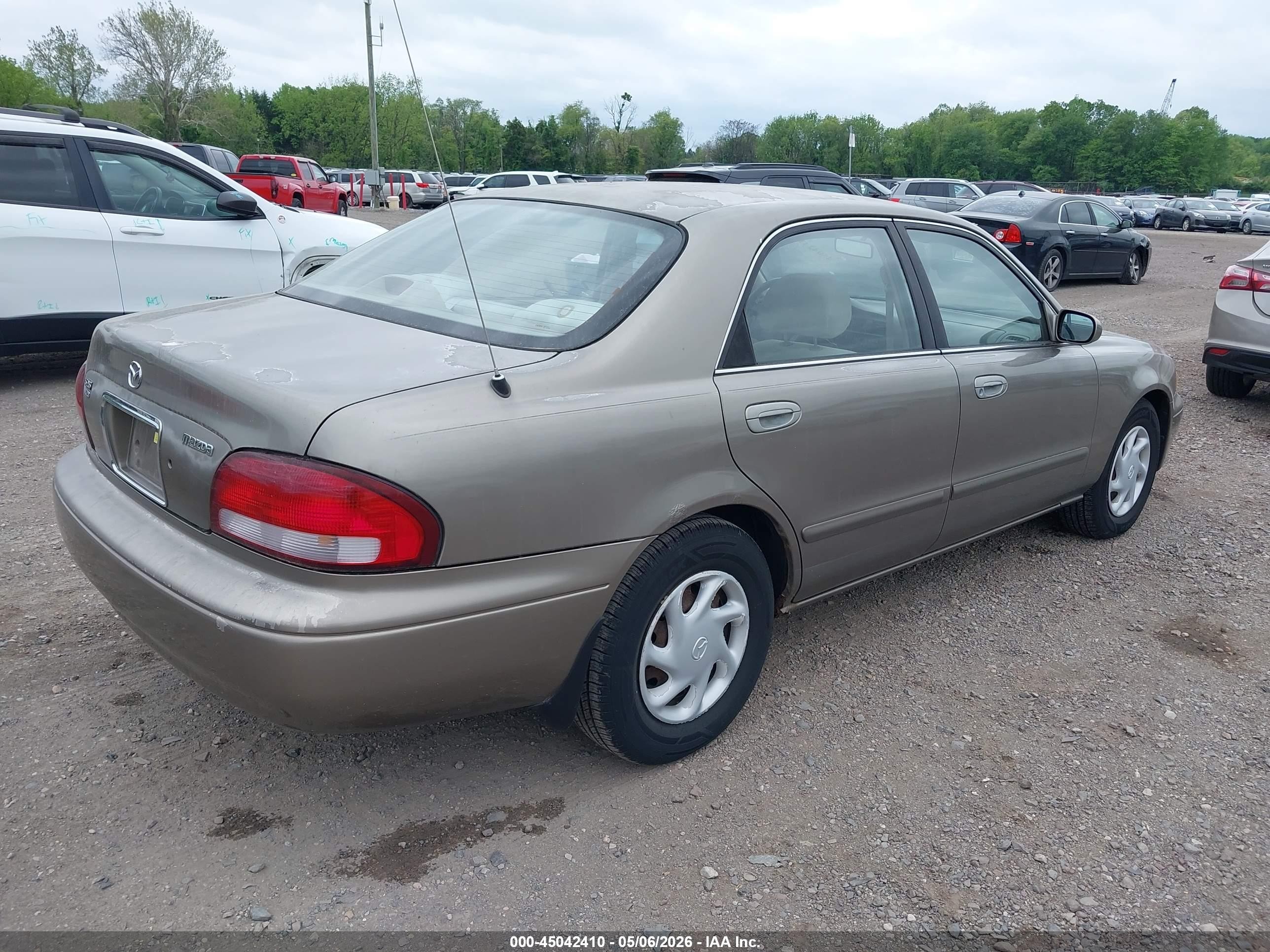 1998 Mazda 626 Dx/lx Champagne vin: 1YVGF22C1W5727458