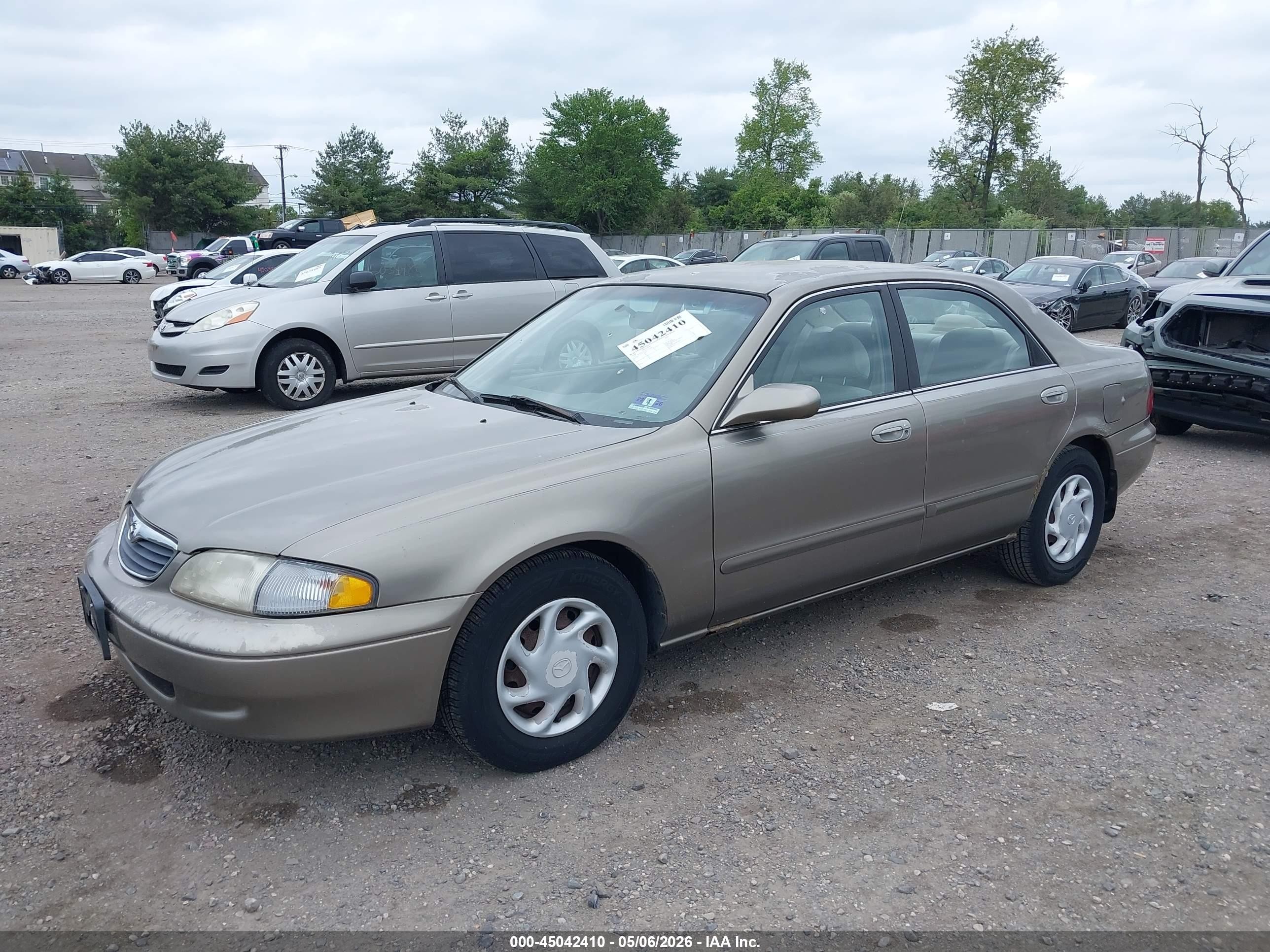 1998 Mazda 626 Dx/lx Champagne vin: 1YVGF22C1W5727458