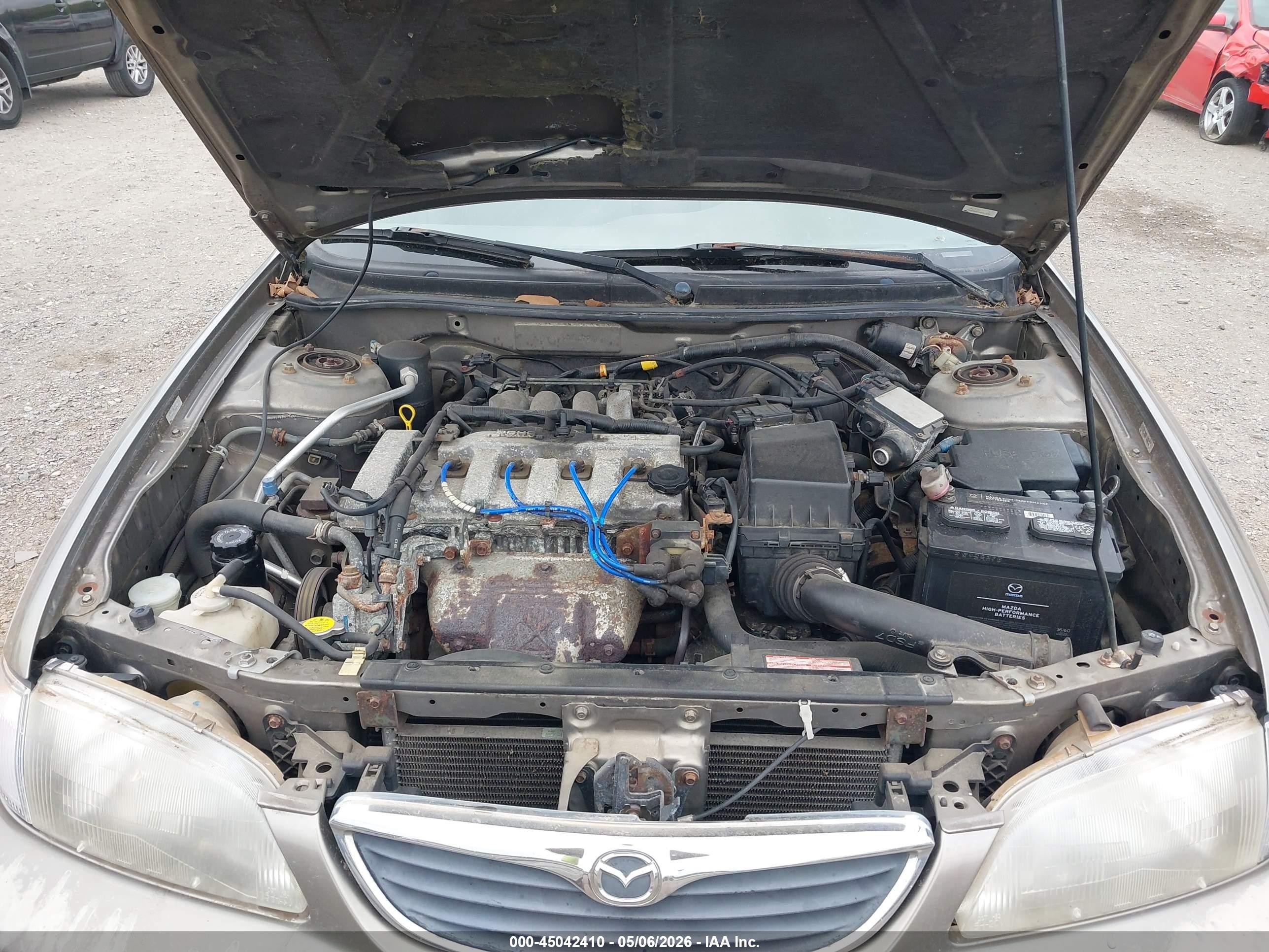 1998 Mazda 626 Dx/lx Champagne vin: 1YVGF22C1W5727458