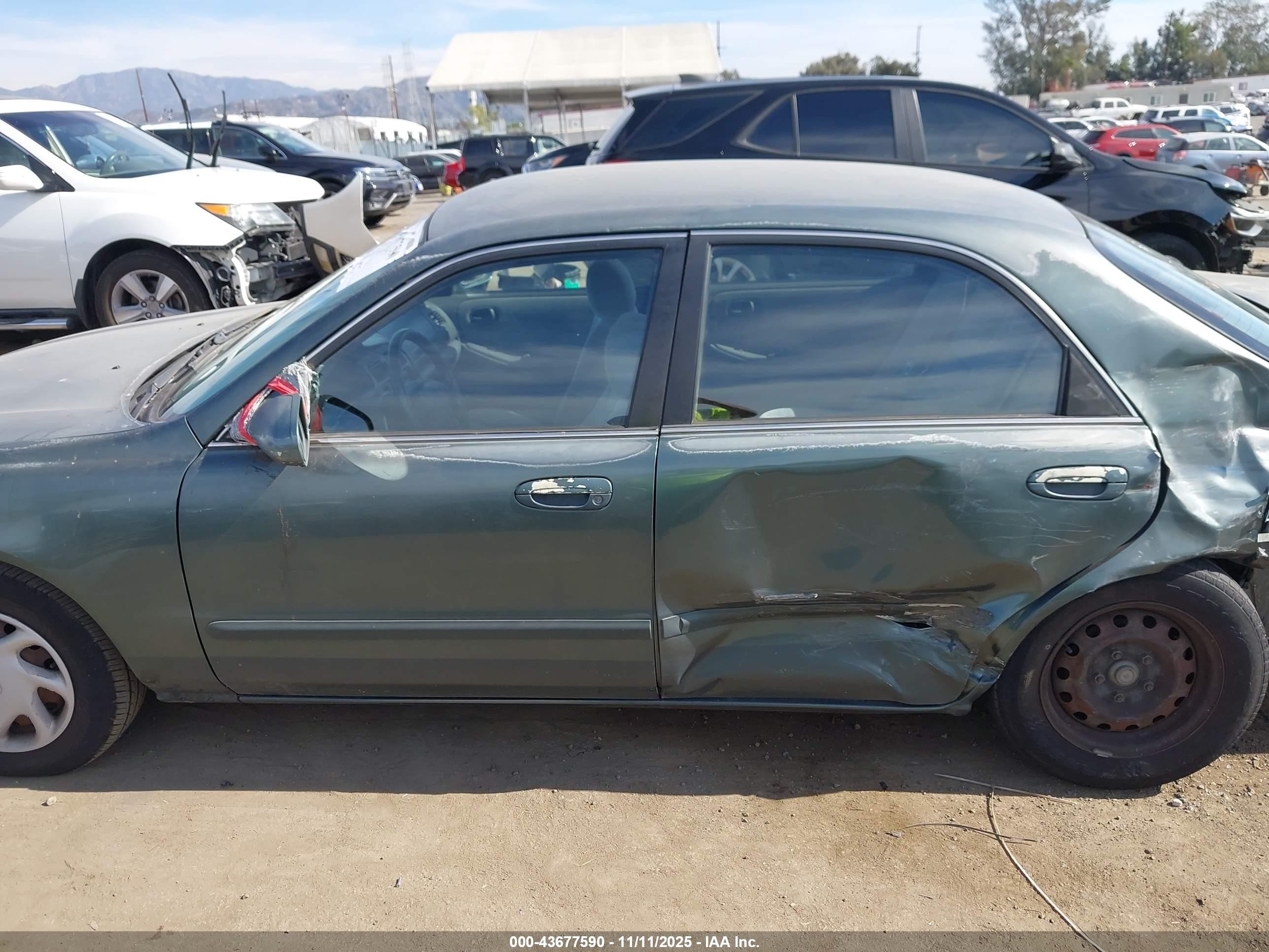 1998 Mazda 626 Dx/lx Green vin: 1YVGF22C2W5691764