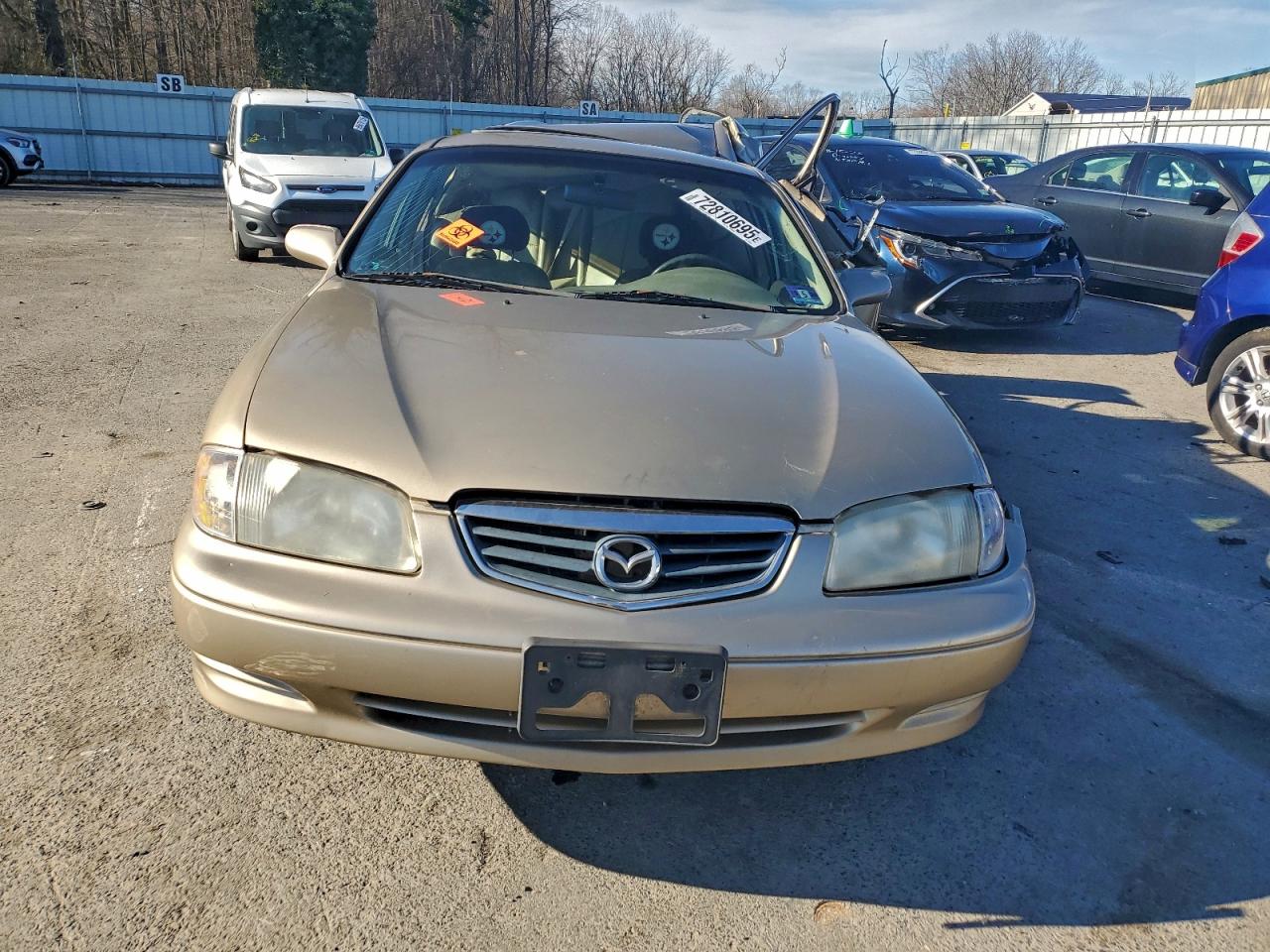 2001 Mazda 626 Es Beige vin: 1YVGF22C315200658