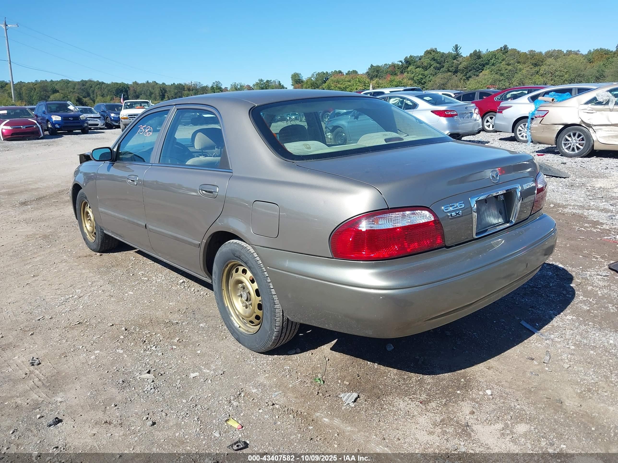 2001 Mazda 626 Es/lx Gold vin: 1YVGF22C315234647