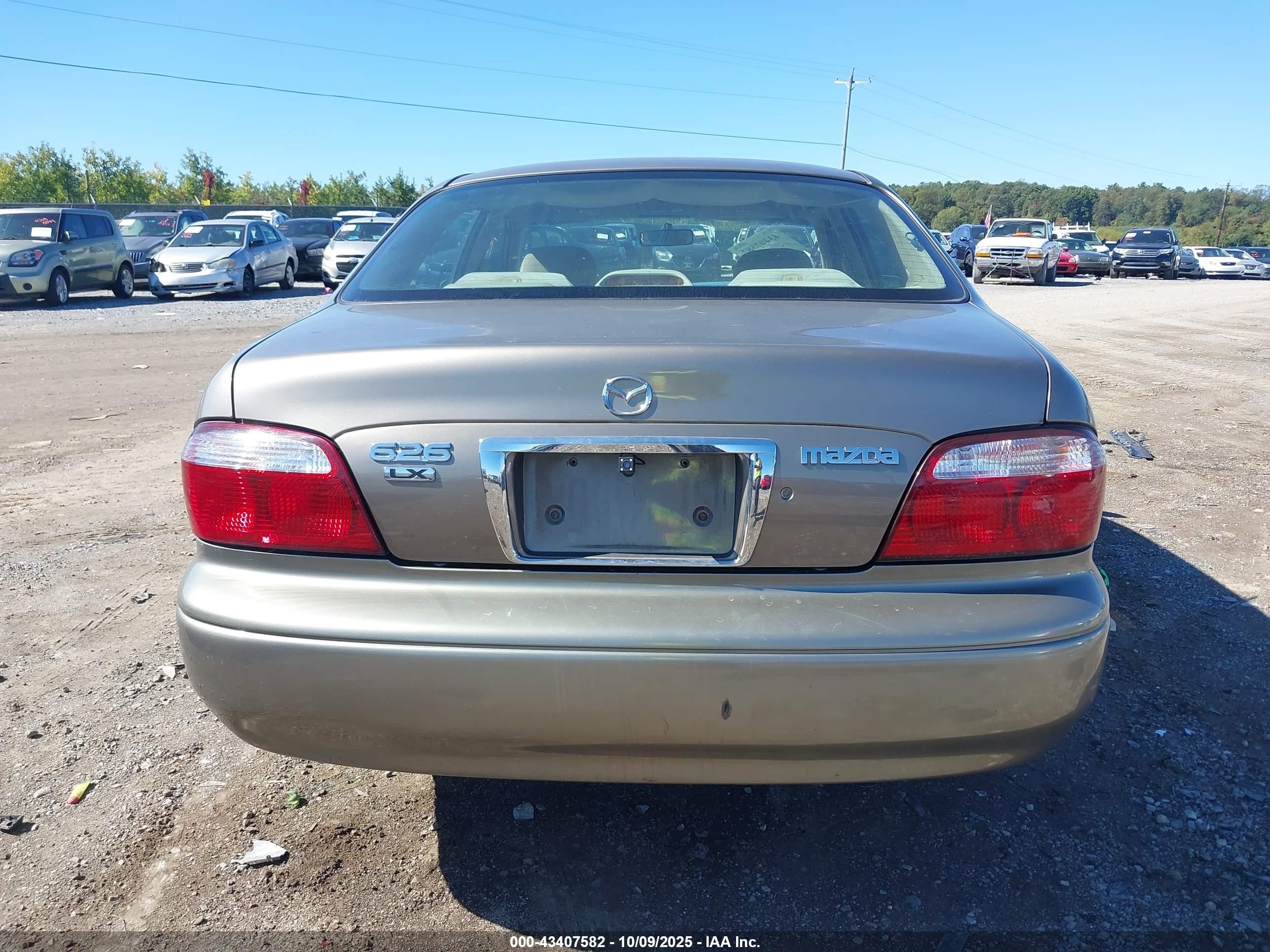 2001 Mazda 626 Es/lx Gold vin: 1YVGF22C315234647