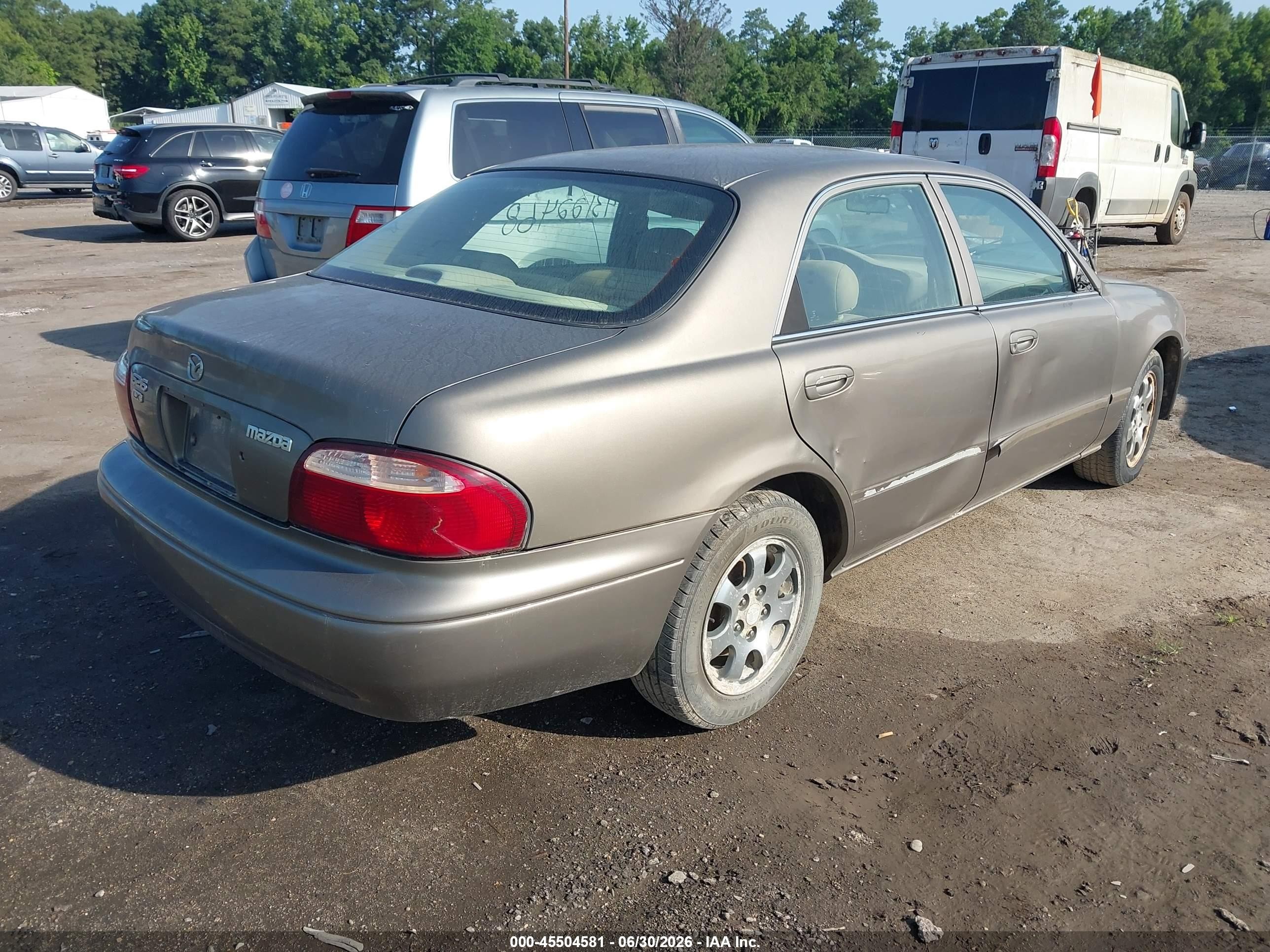 2001 Mazda 626 Es/lx Gold vin: 1YVGF22C715243187