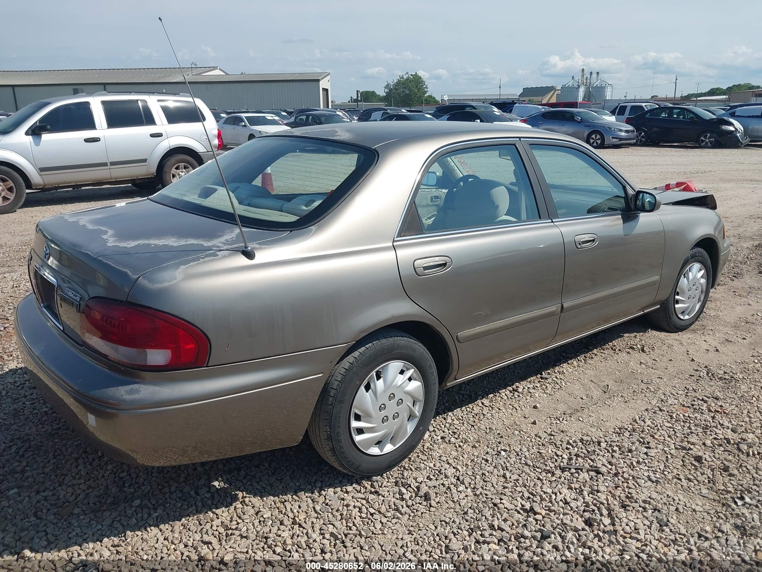 1999 Mazda 626 Es/lx Brown vin: 1YVGF22C7X5865541