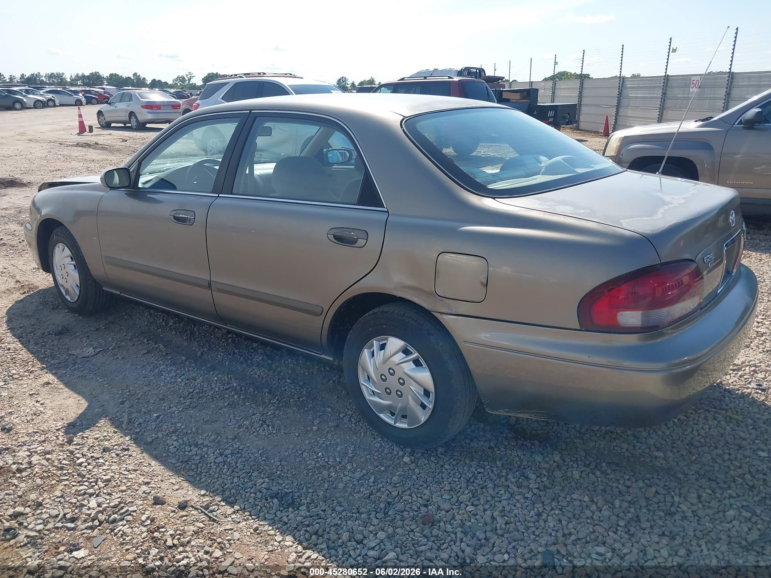 1999 Mazda 626 Es/lx Brown vin: 1YVGF22C7X5865541