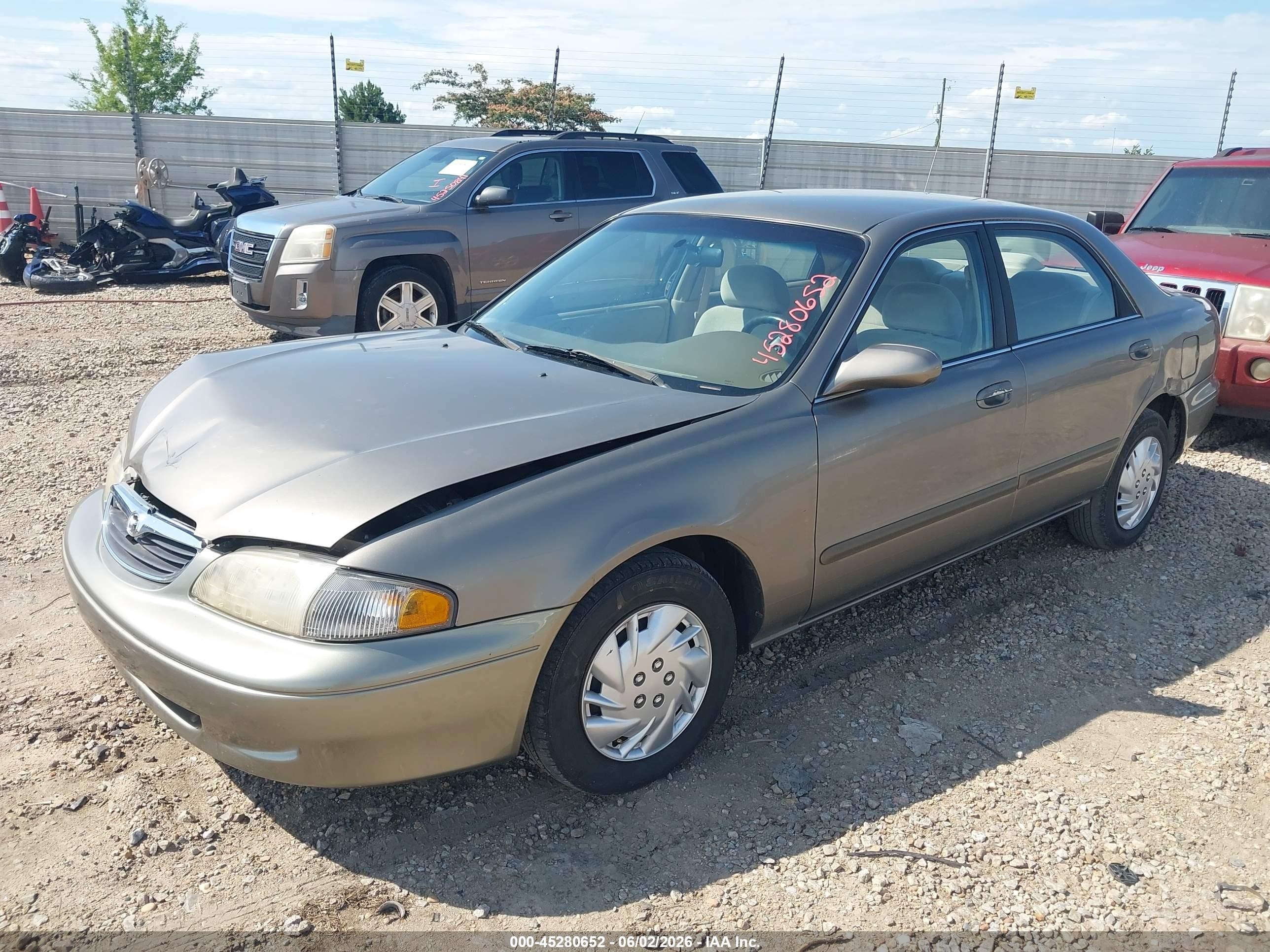 1999 Mazda 626 Es/lx Brown vin: 1YVGF22C7X5865541