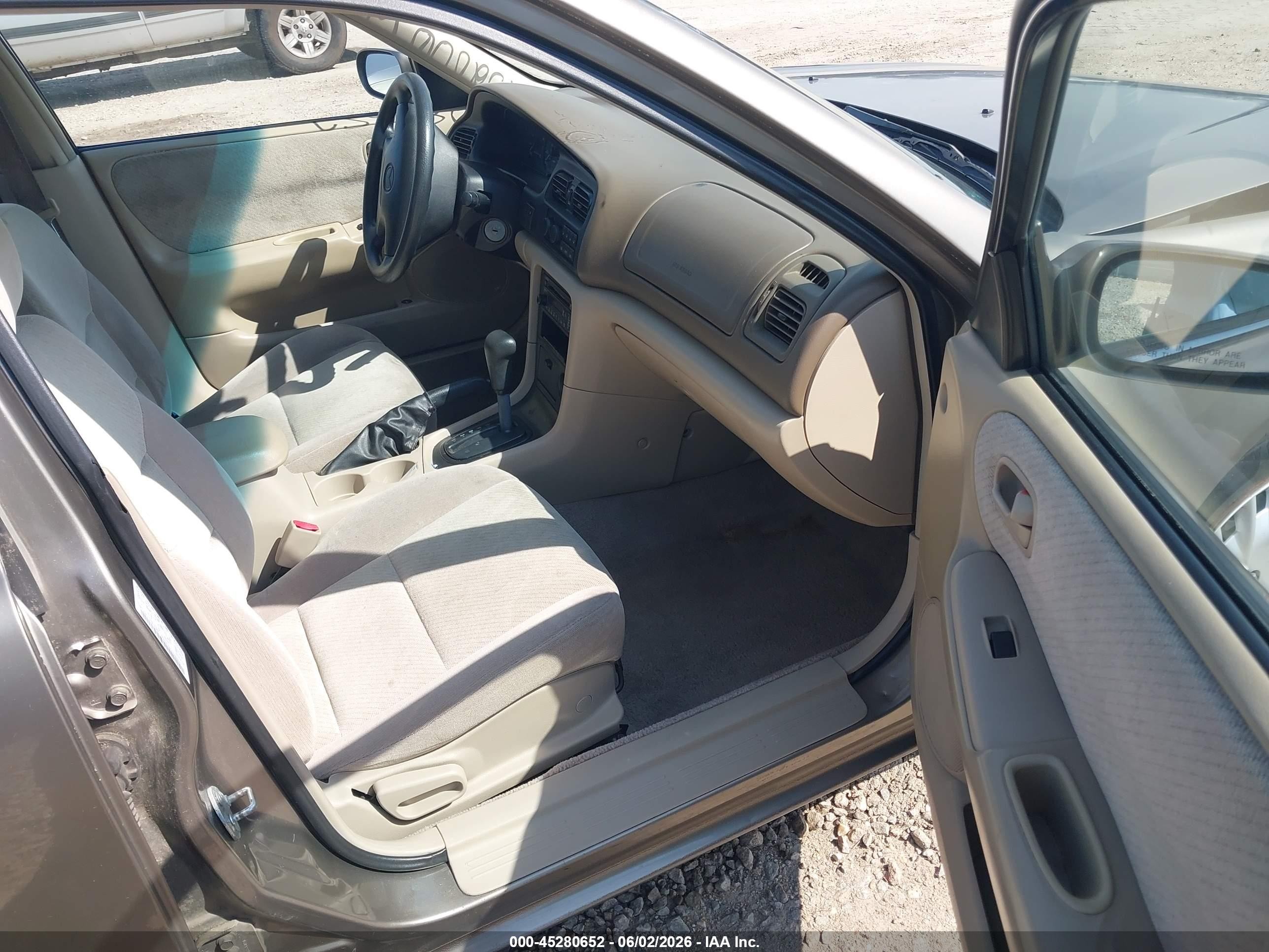 1999 Mazda 626 Es/lx Brown vin: 1YVGF22C7X5865541