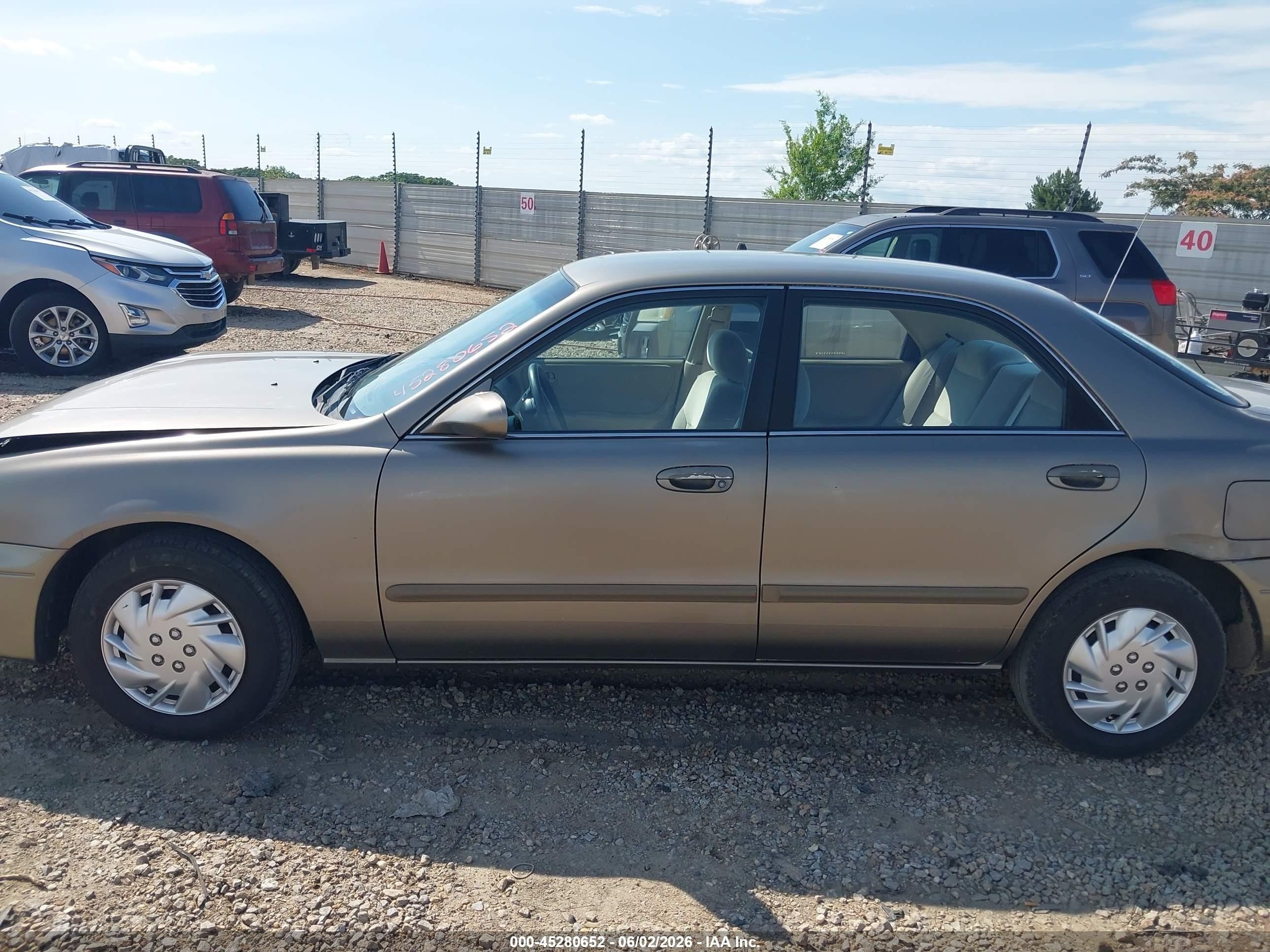 1999 Mazda 626 Es/lx Brown vin: 1YVGF22C7X5865541