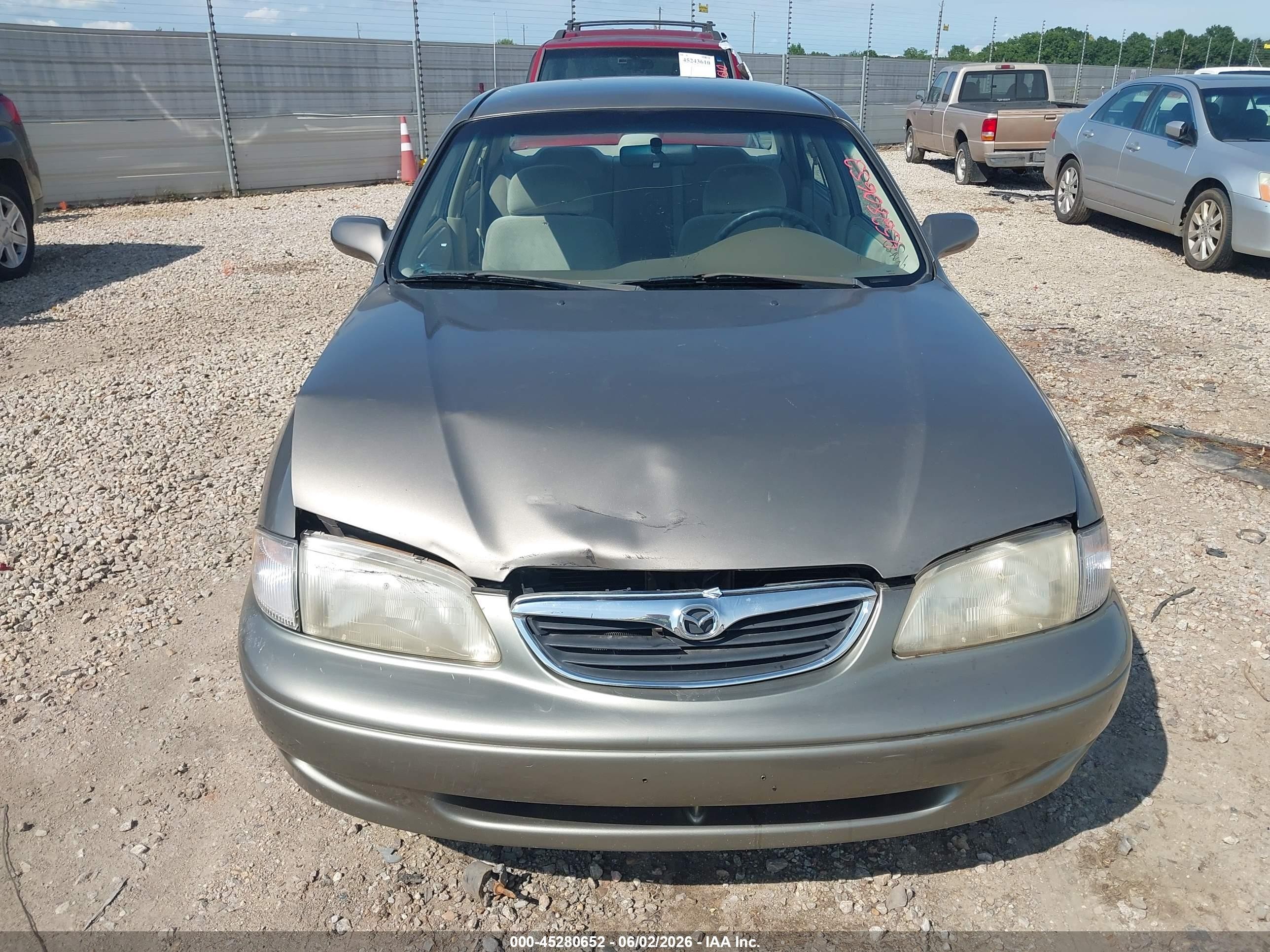 1999 Mazda 626 Es/lx Brown vin: 1YVGF22C7X5865541