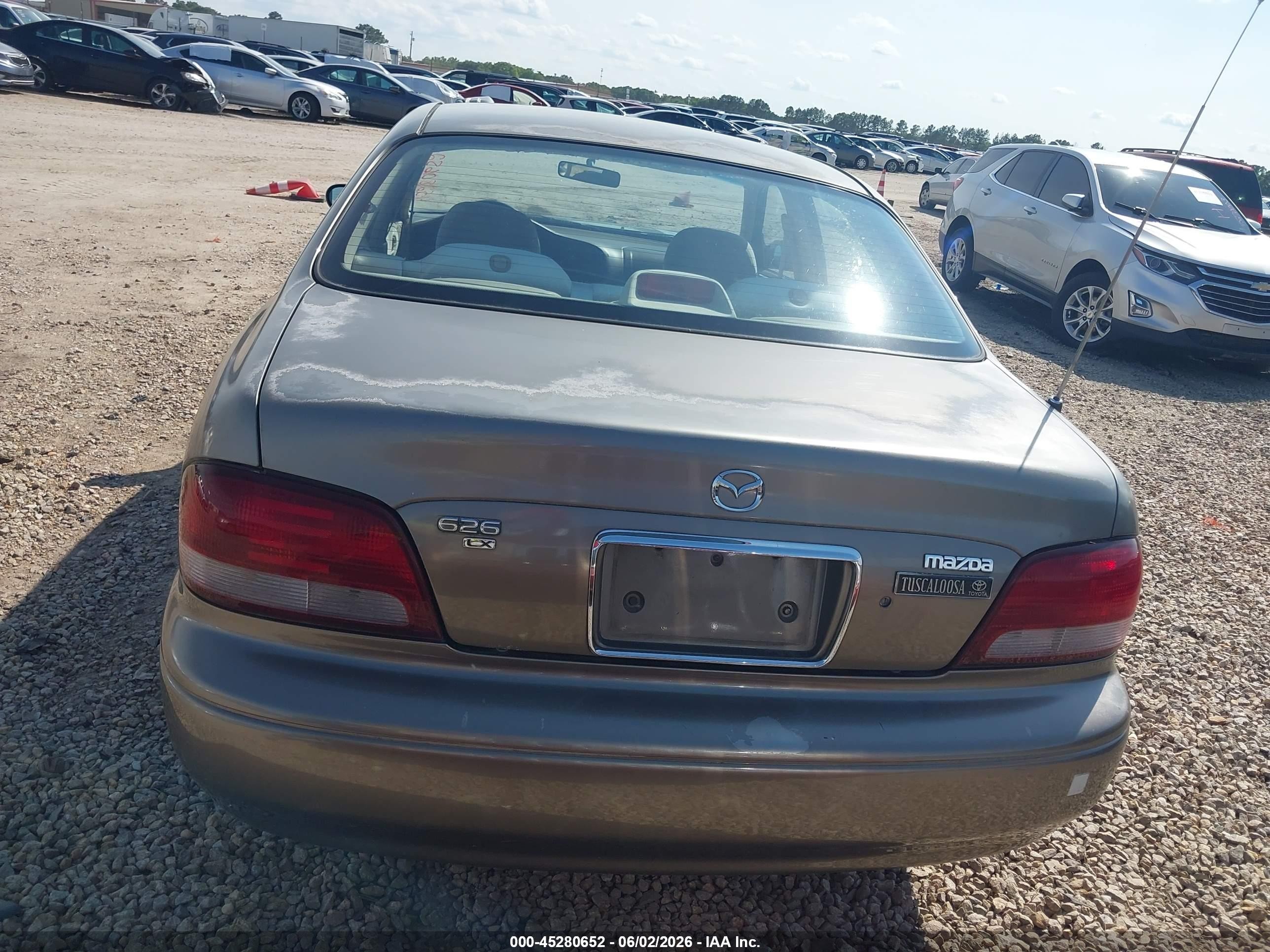 1999 Mazda 626 Es/lx Brown vin: 1YVGF22C7X5865541